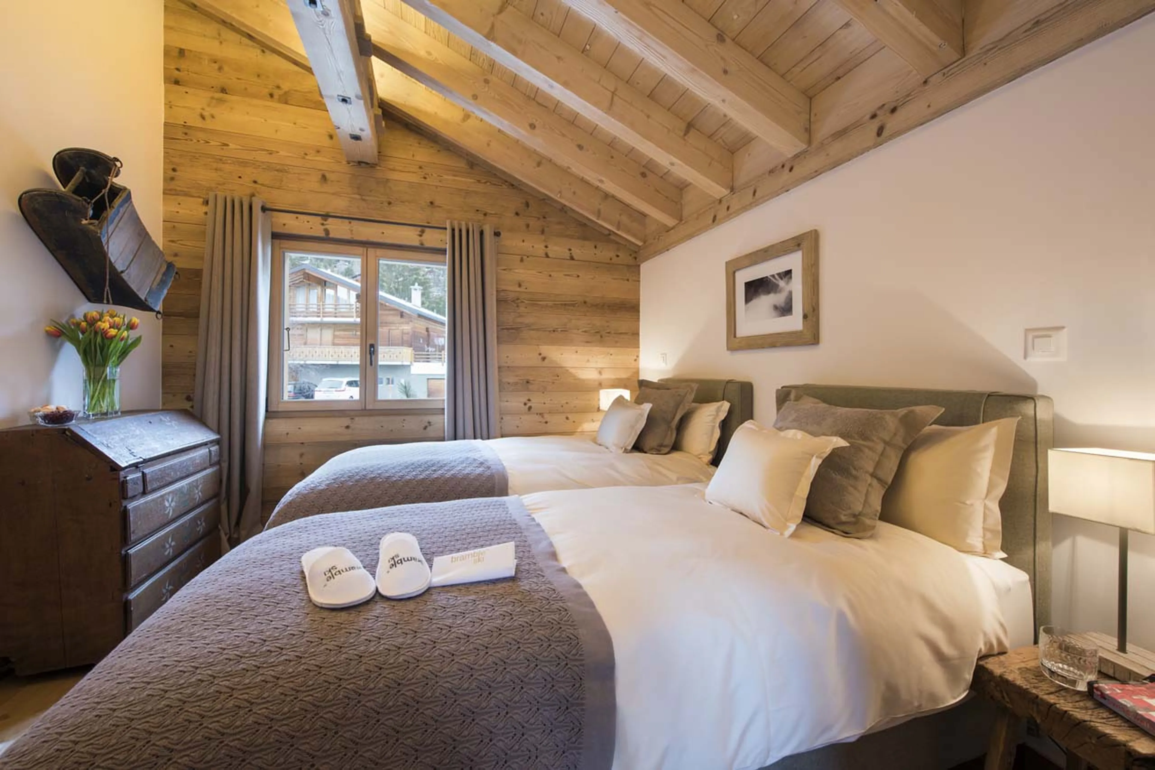 Bedroom five twin beds in Chalet Delormes in Verbier