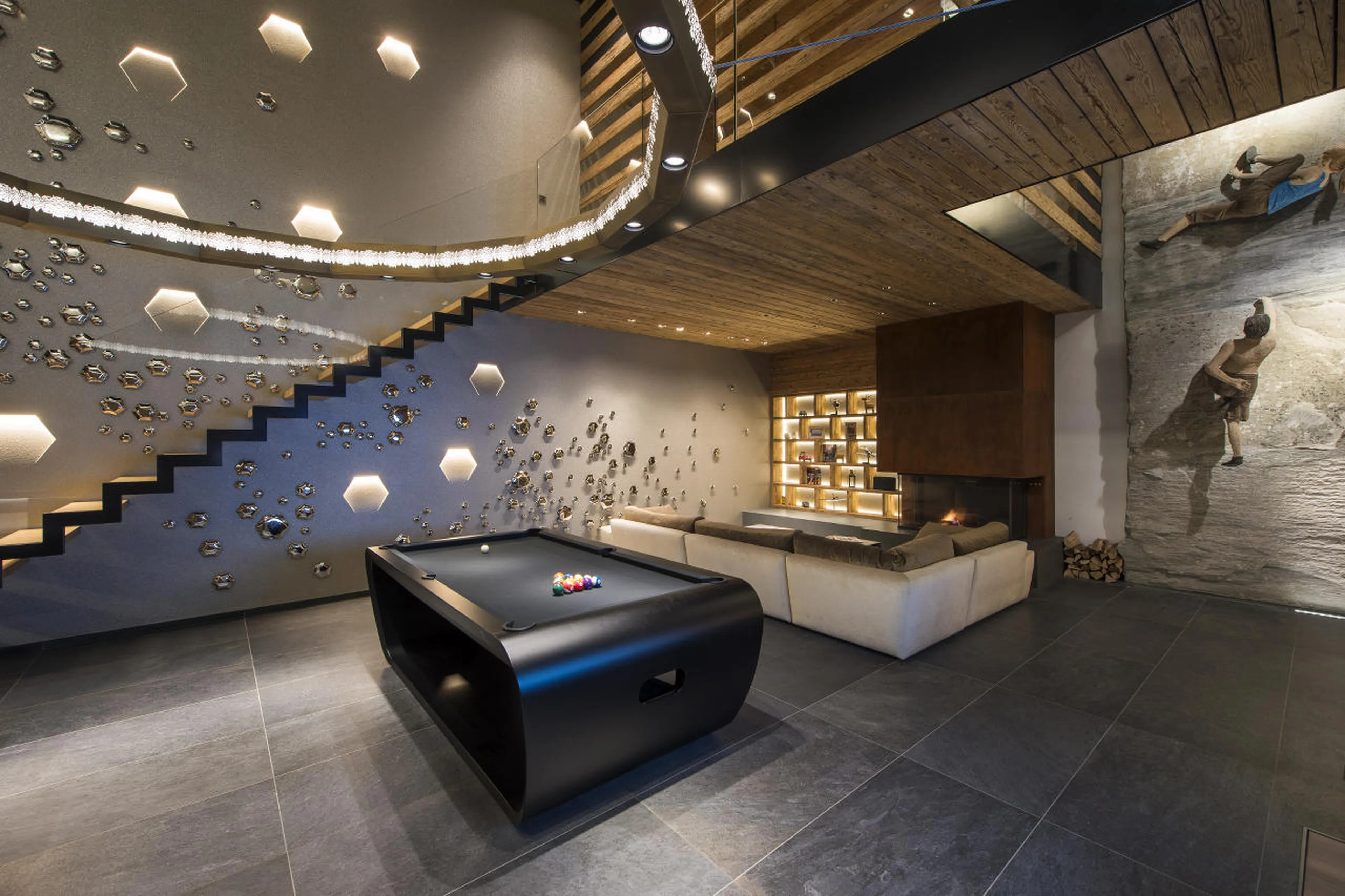 Communal lounge and pool table at Chalet Denali in Zermatt