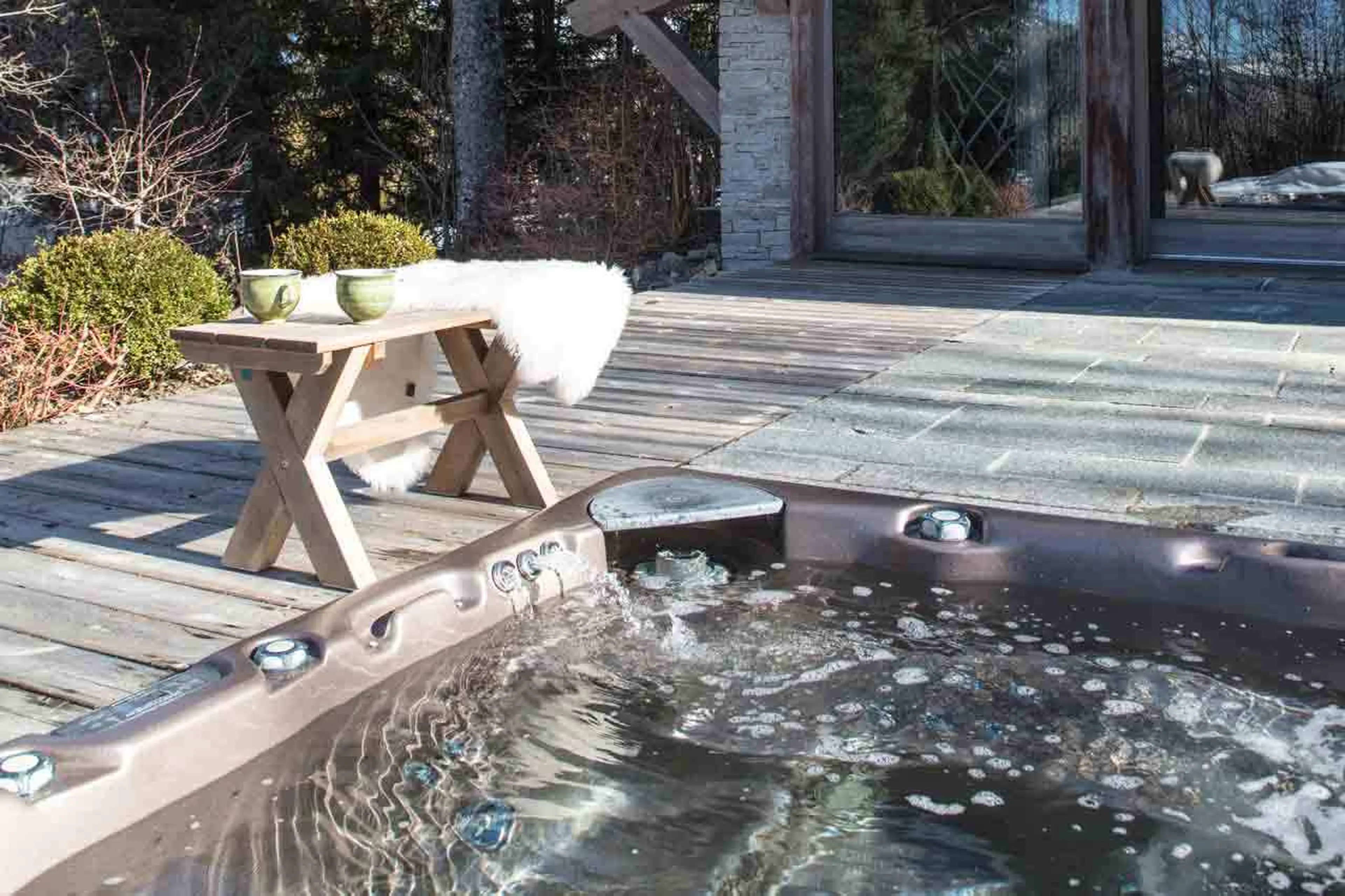 Outdoor Jacuzzi at Chalet des Ecureuils in Megeve