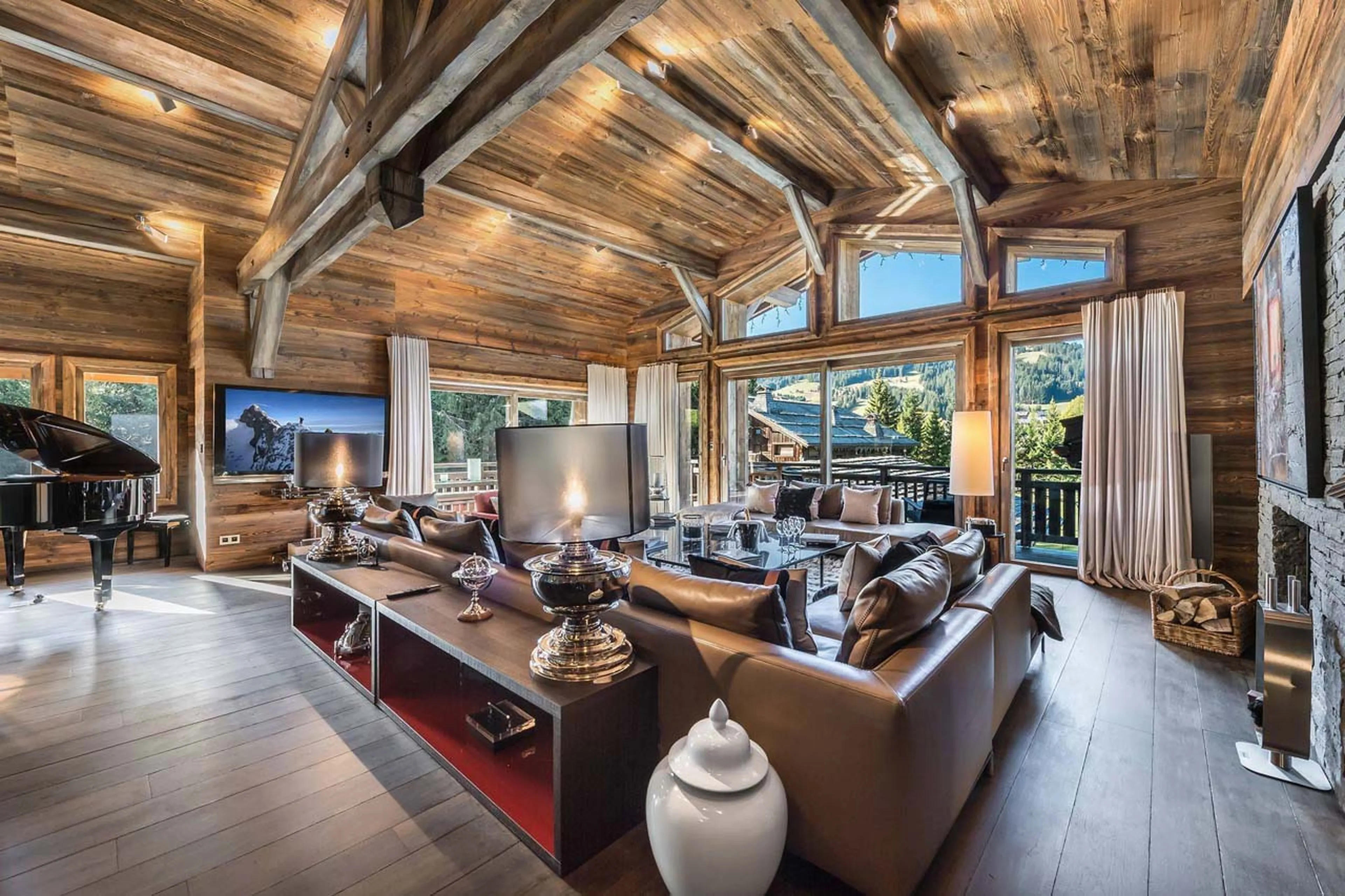 Grand piano in living area of Chalet Des Sens in Megeve
