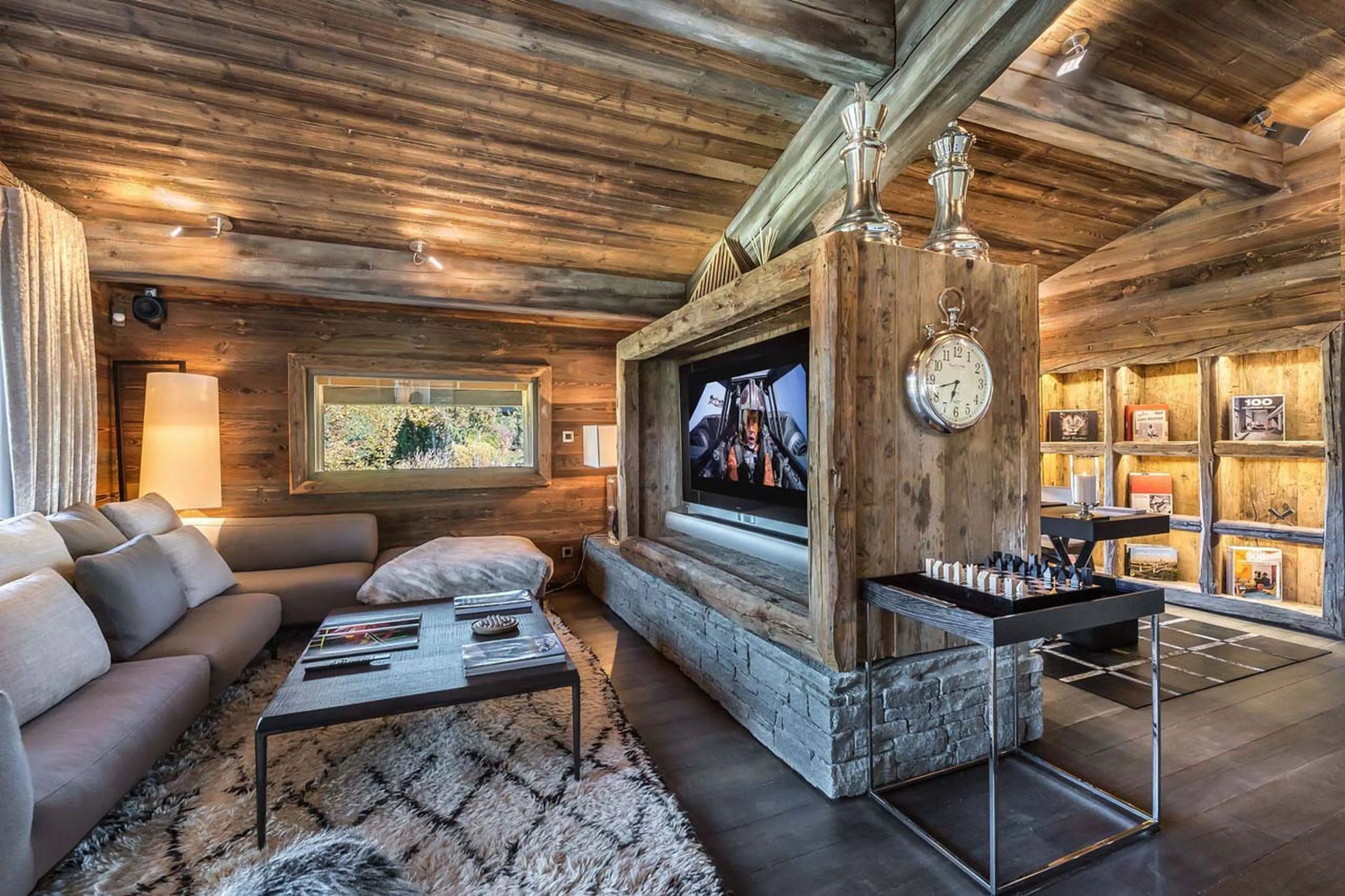 TV lounge and office at Chalet Des Sens in Megeve