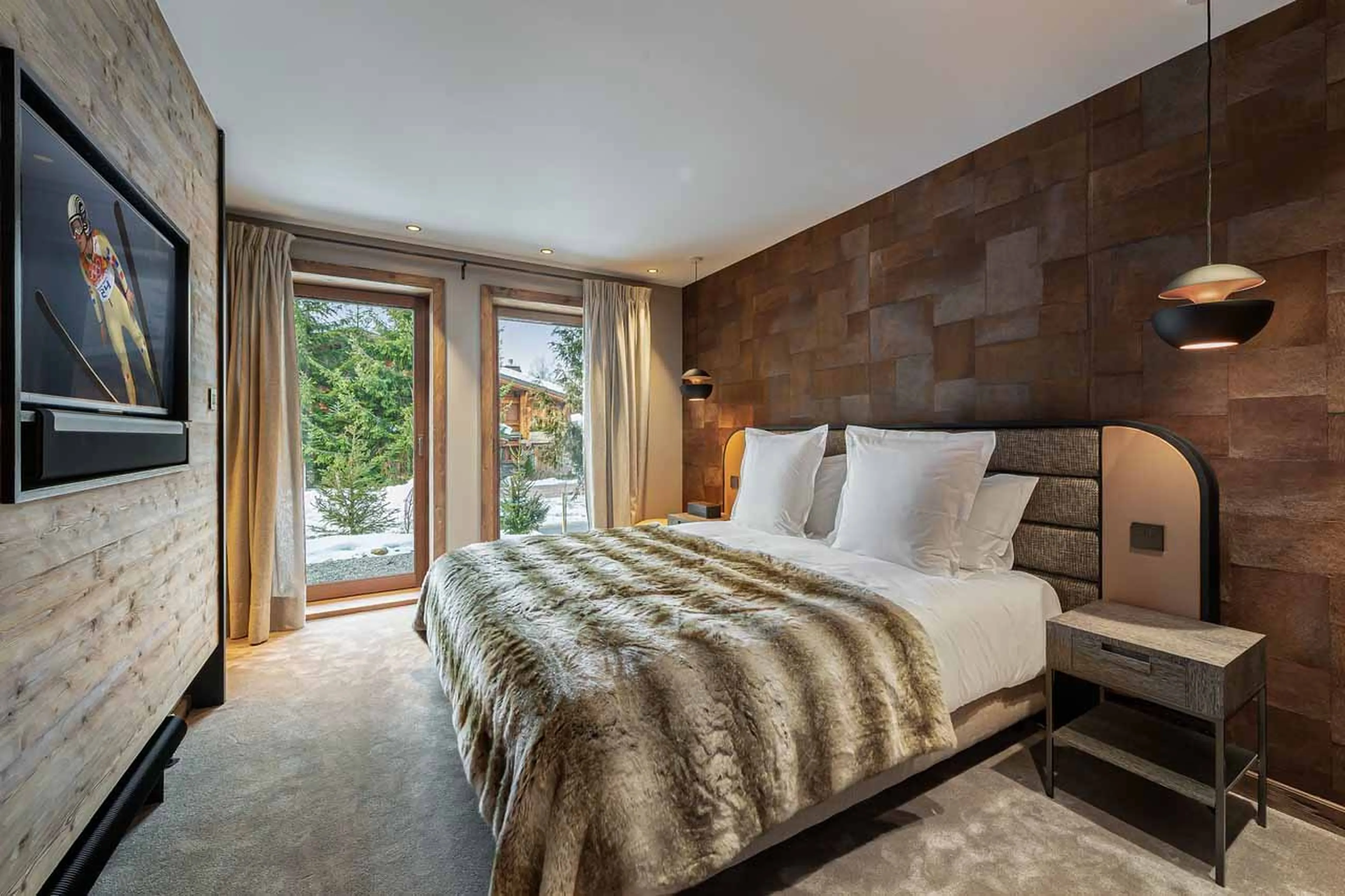 Bedroom one at Chalet Divinity in Megeve