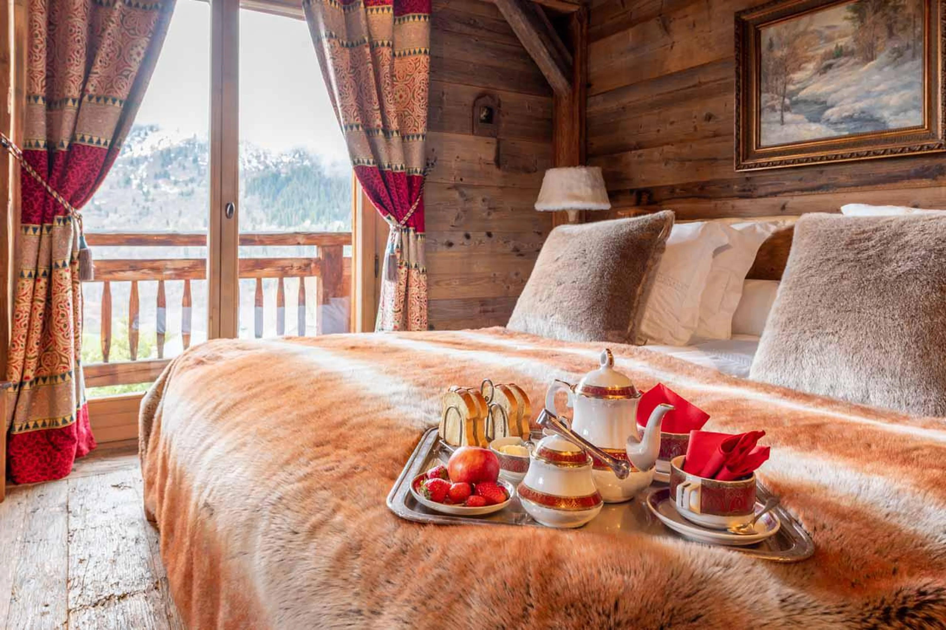Bedroom one balcony at Chalet Druchka in Meribel