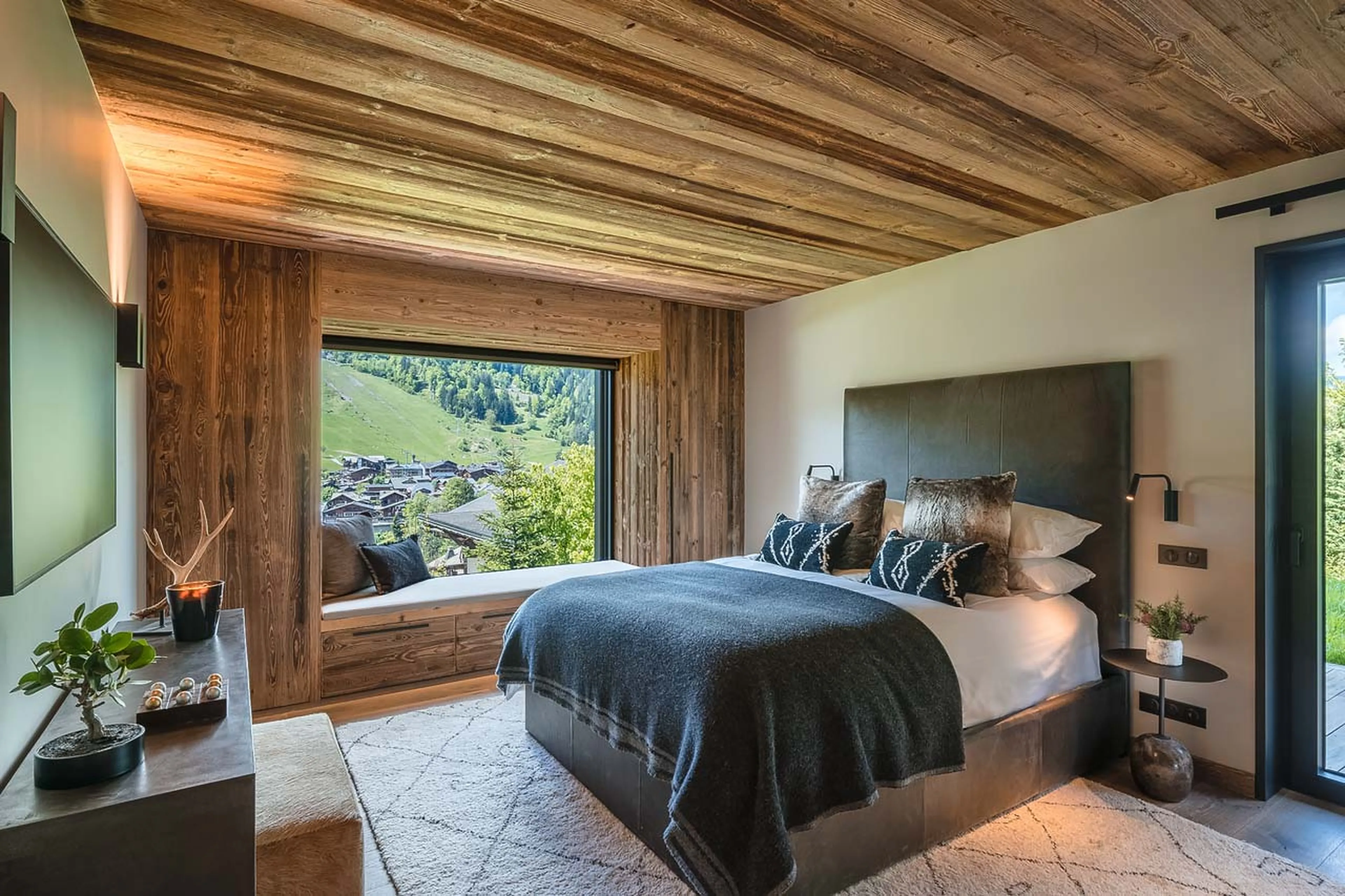 Master suite with window suite at Chalet Ecliptique in Morzine