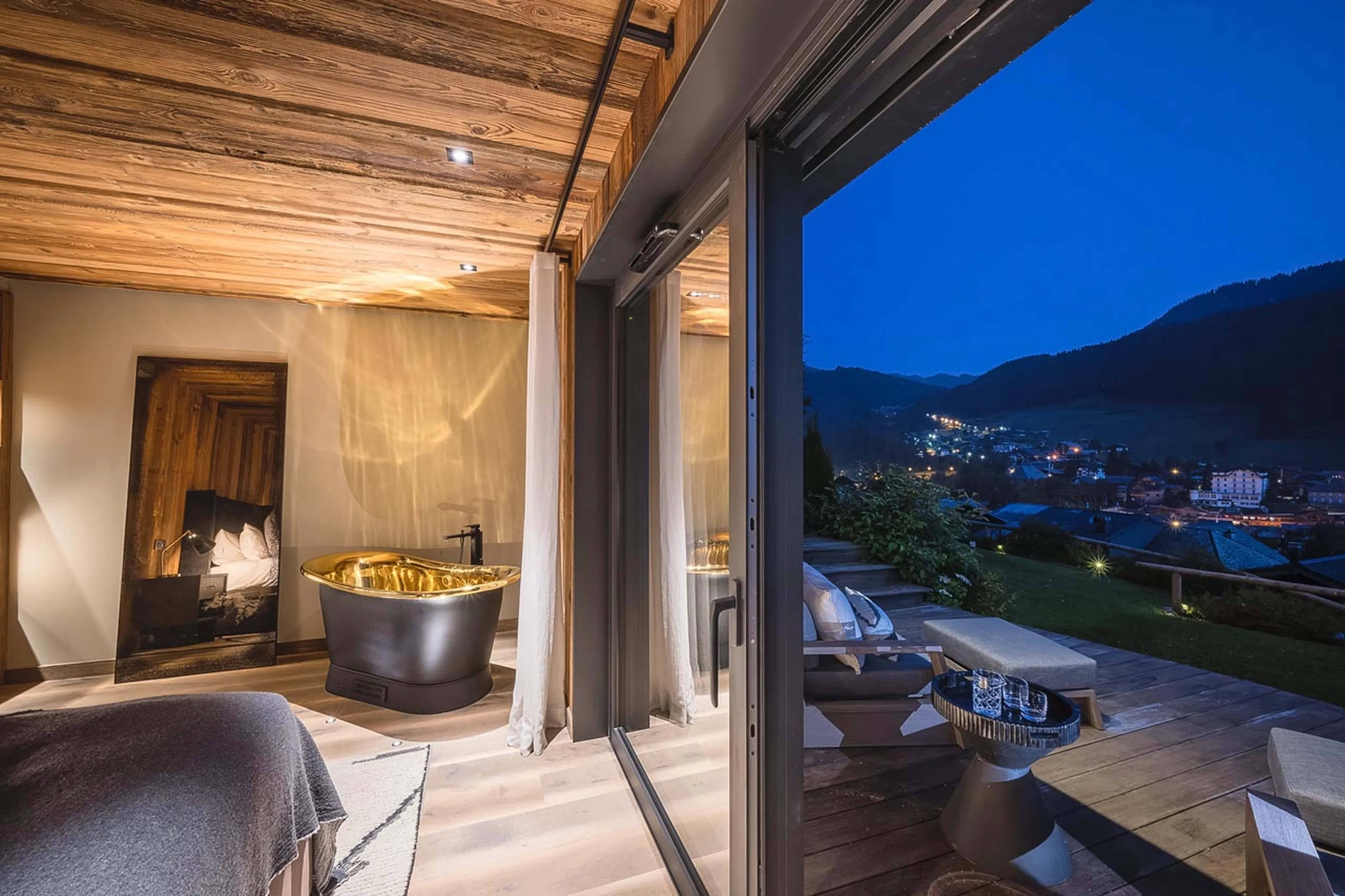 Copper bathtub in bedroom five at Chalet Ecliptique in Morzine