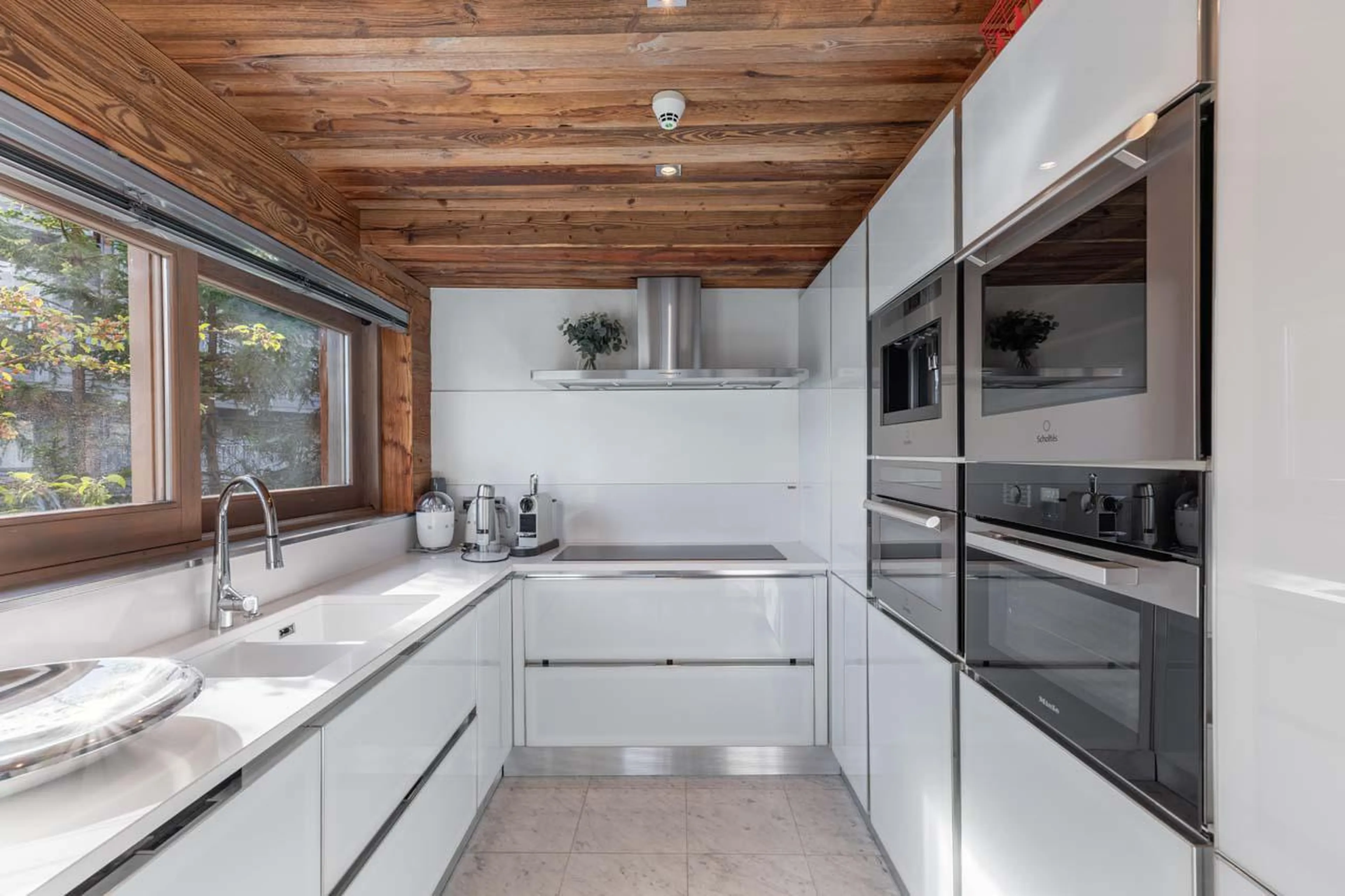 Modern and well-equipped kitchen at Chalet Eden in Courchevel 1850