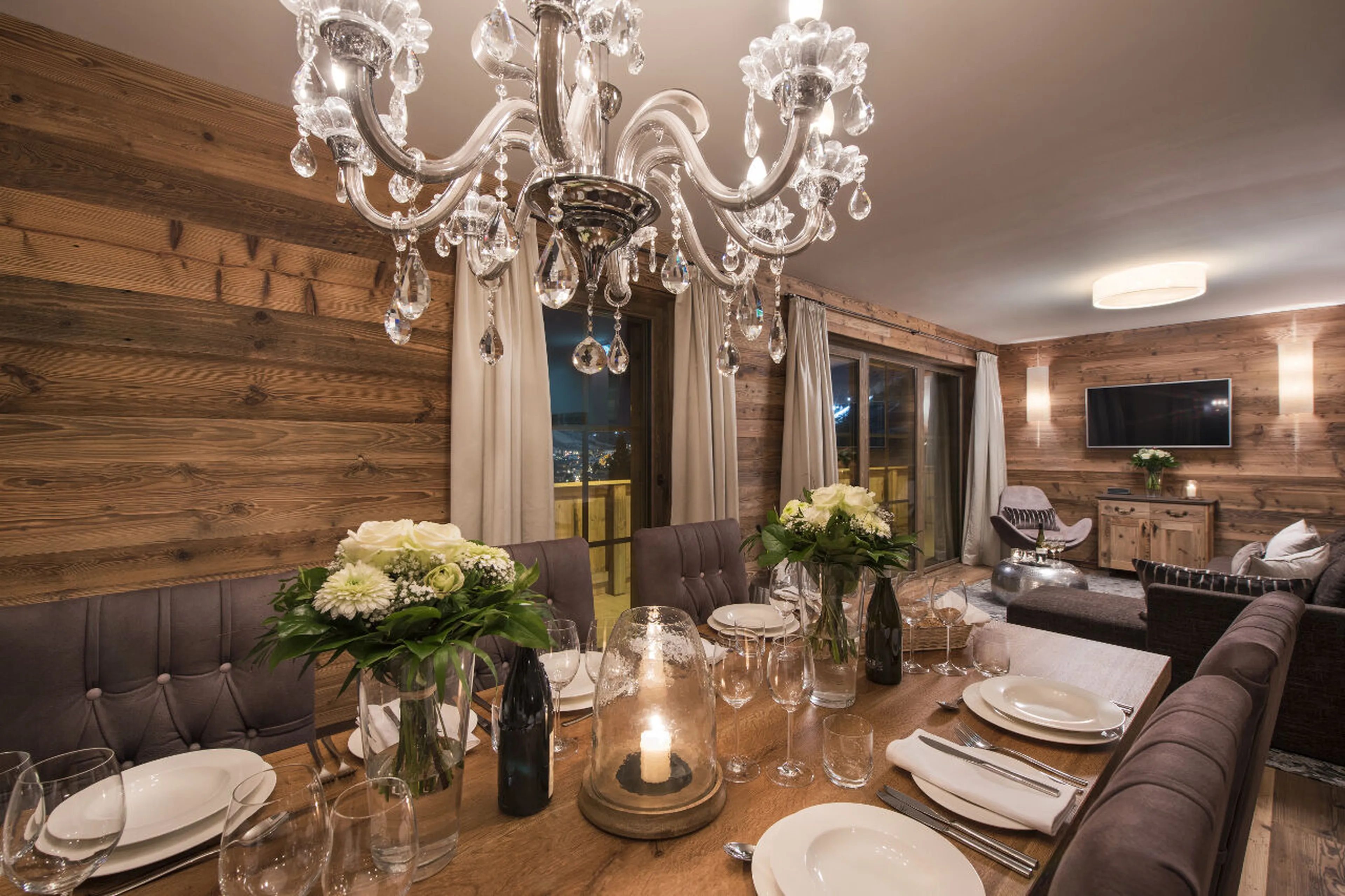 Zari Suite dining area at night in Chalet Eden Rock in St Anton