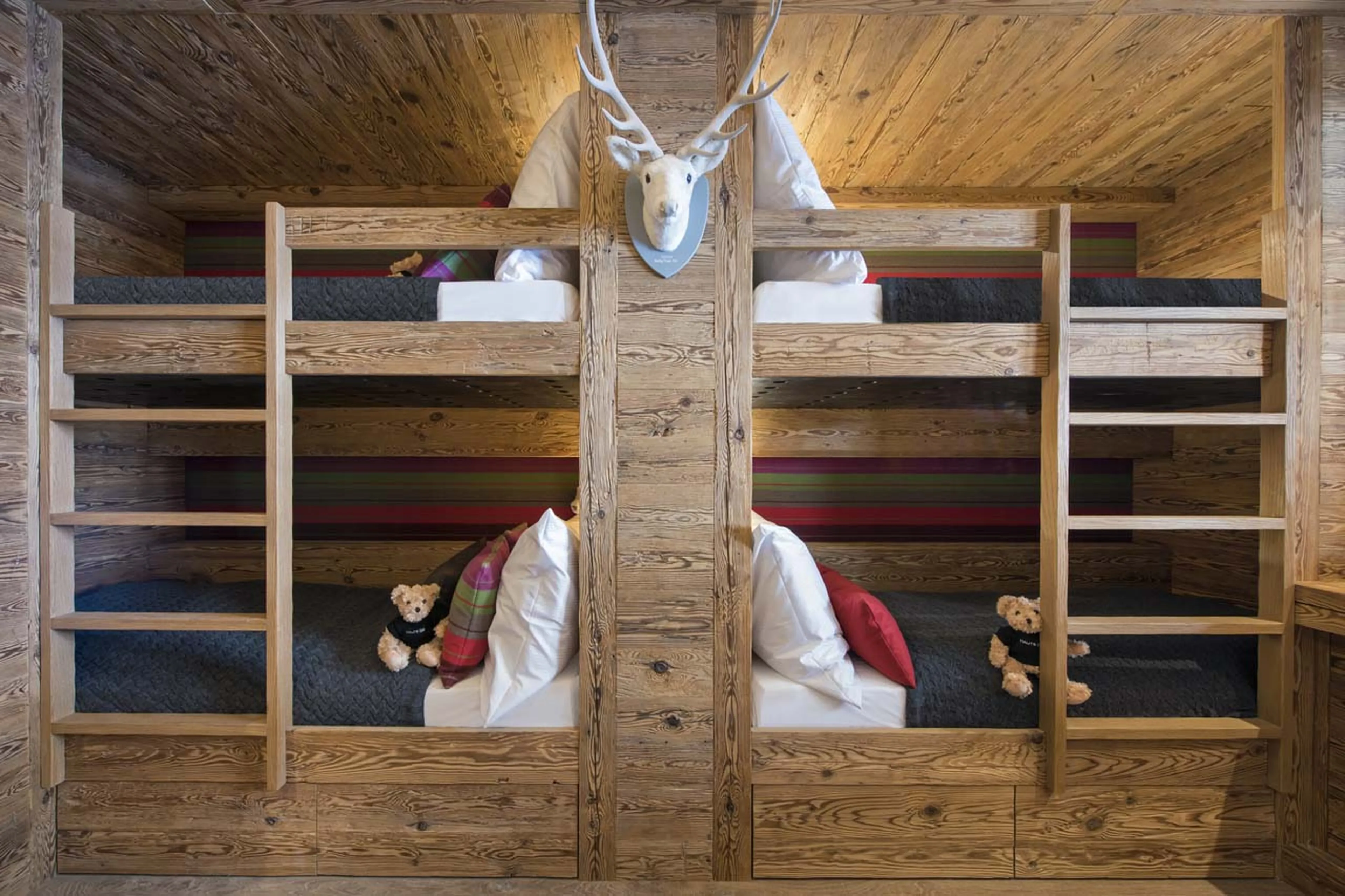 Double bed in master bedroom of Chalet Elbrus in Zermatt