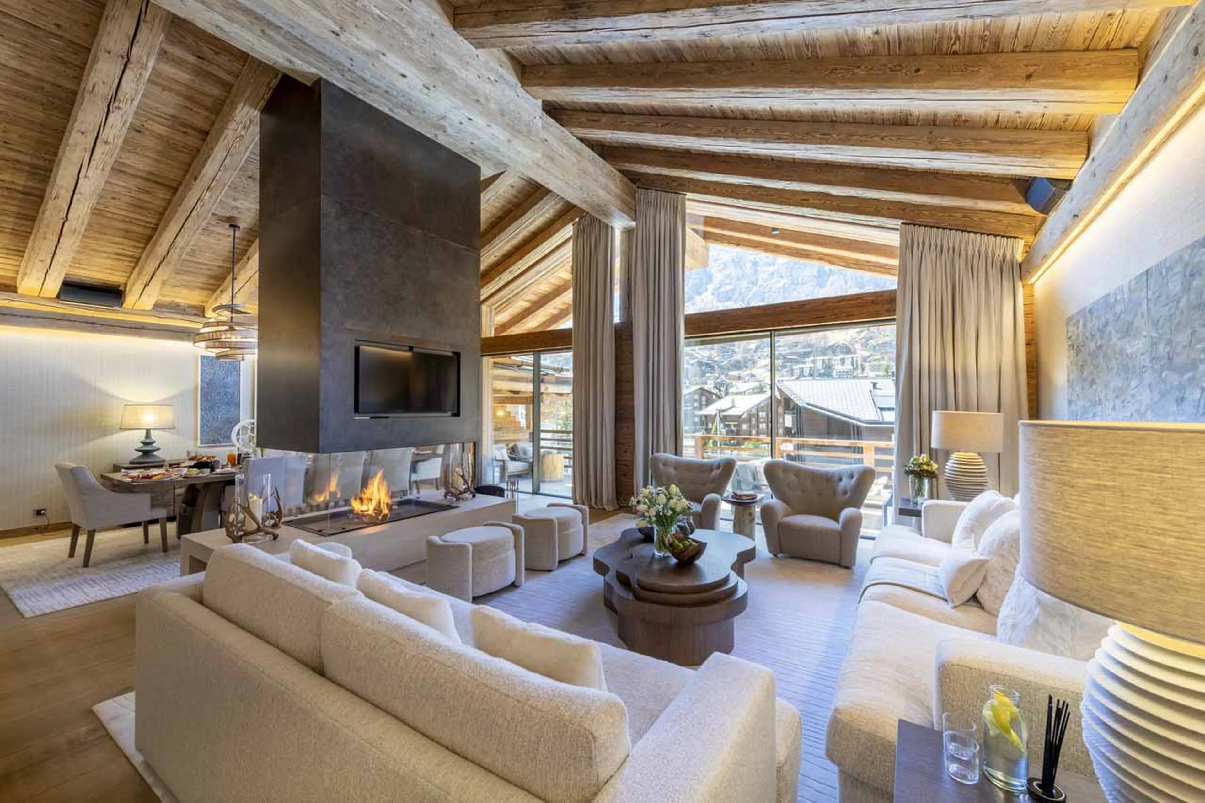 Feature fireplace in living area of Chalet Elbrus in Zermatt