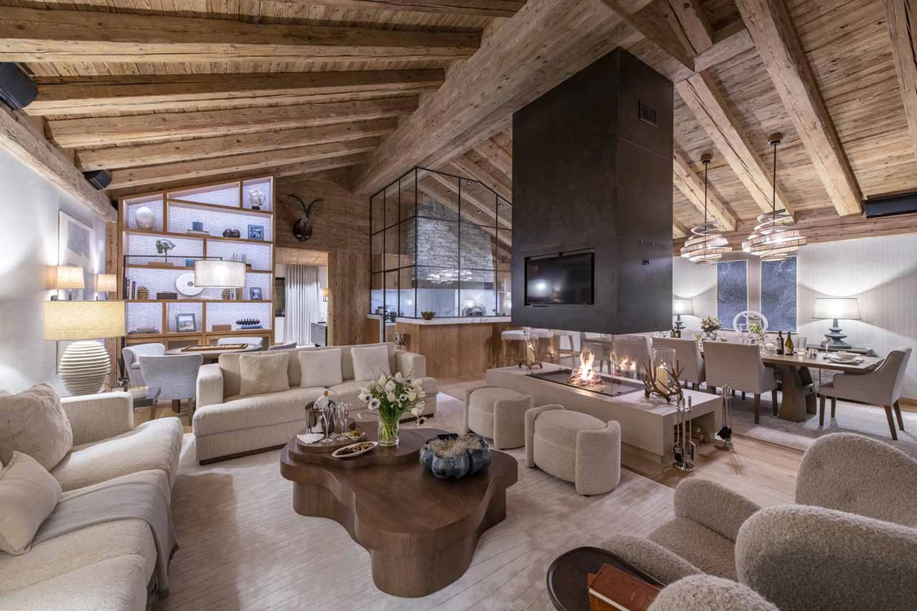 Living area at night at Chalet Elbrus in Zermatt