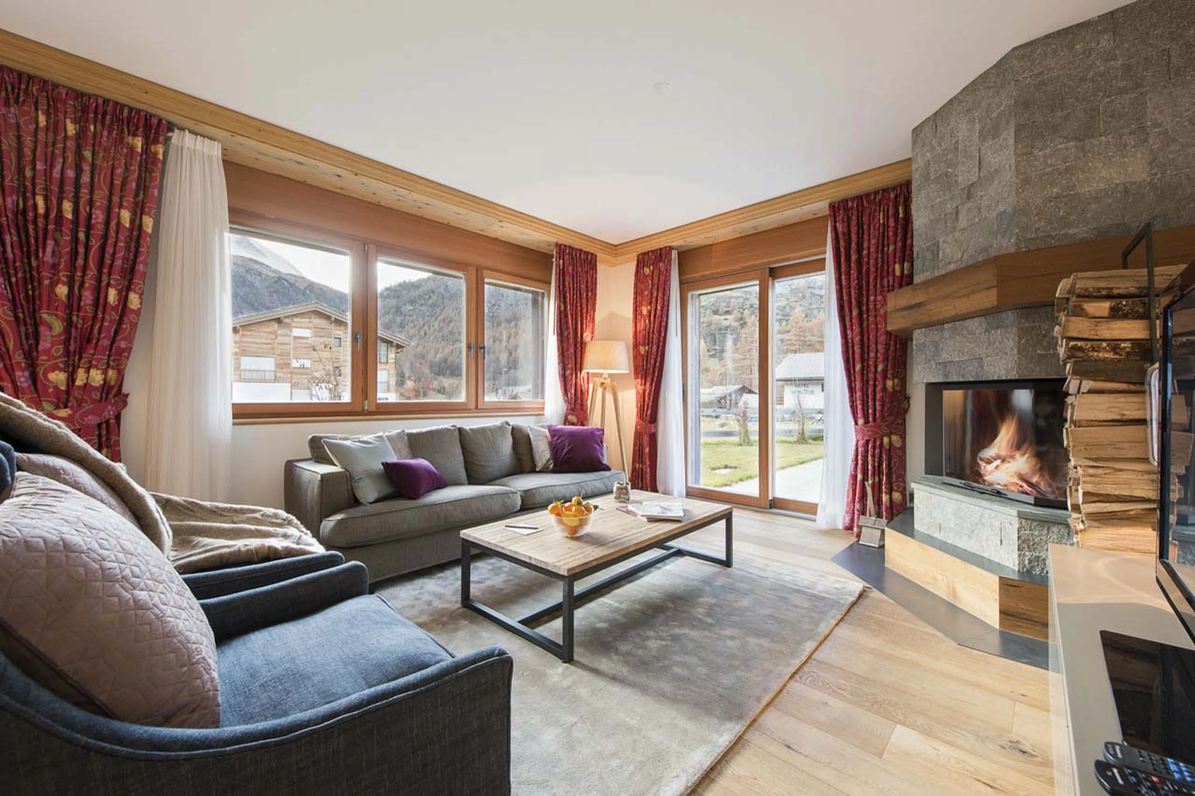 French windows in living room at Chalet Elena in Zermatt