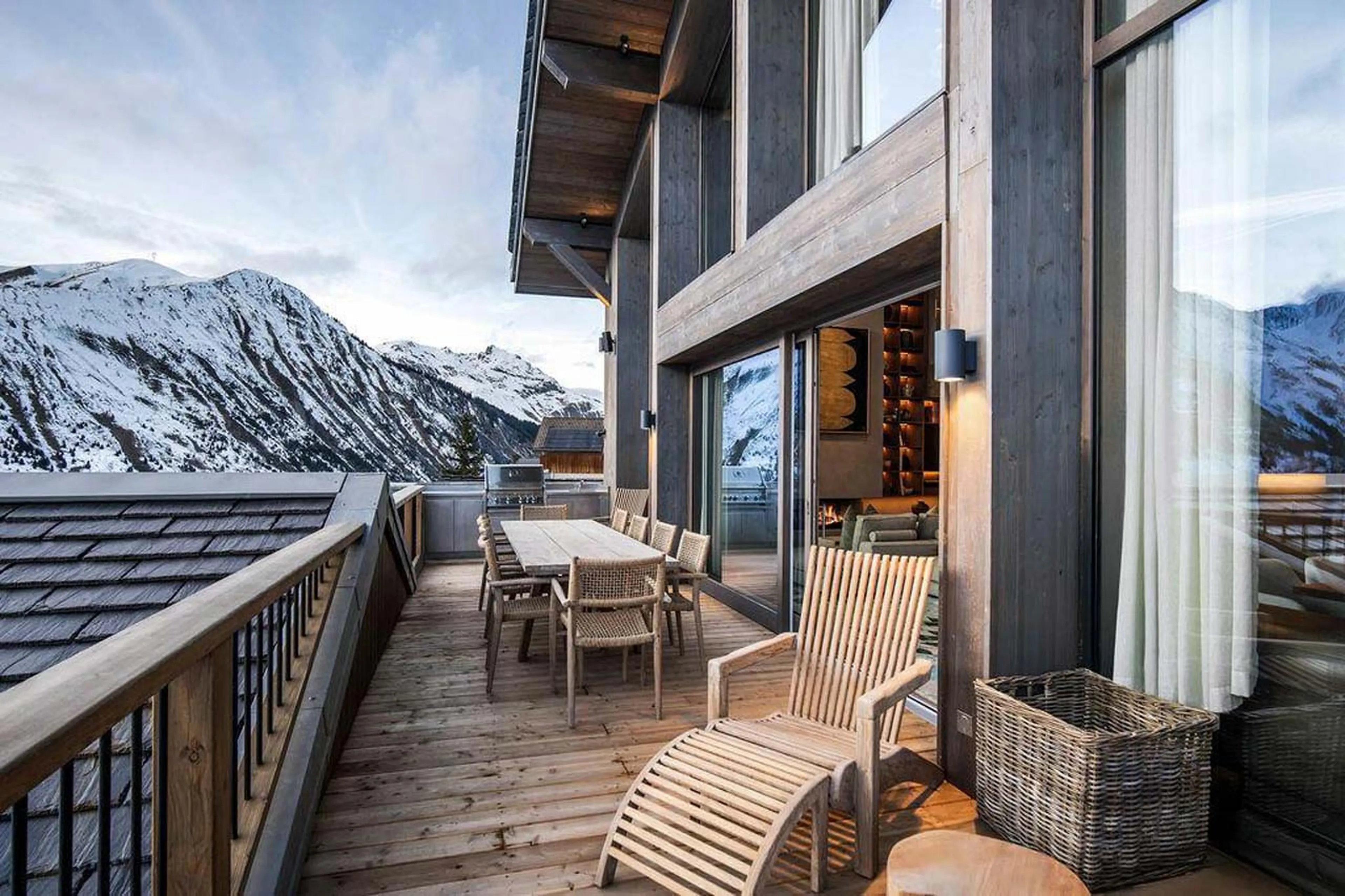 Balcony with table at Chalet Escapade, St Martin de Belleville