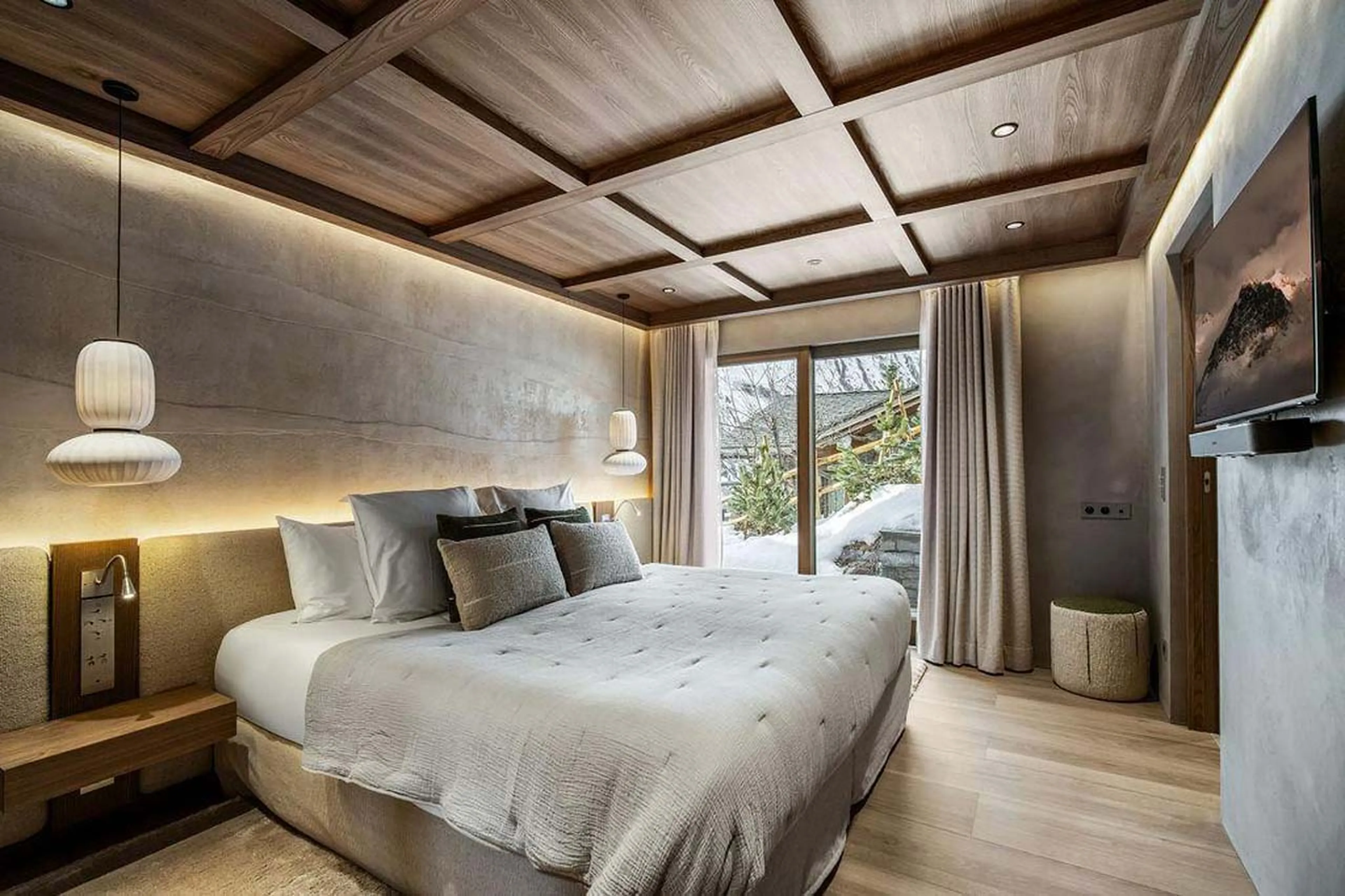 Double bedroom with glass doors in Chalet Escapade, St Martin de Belleville