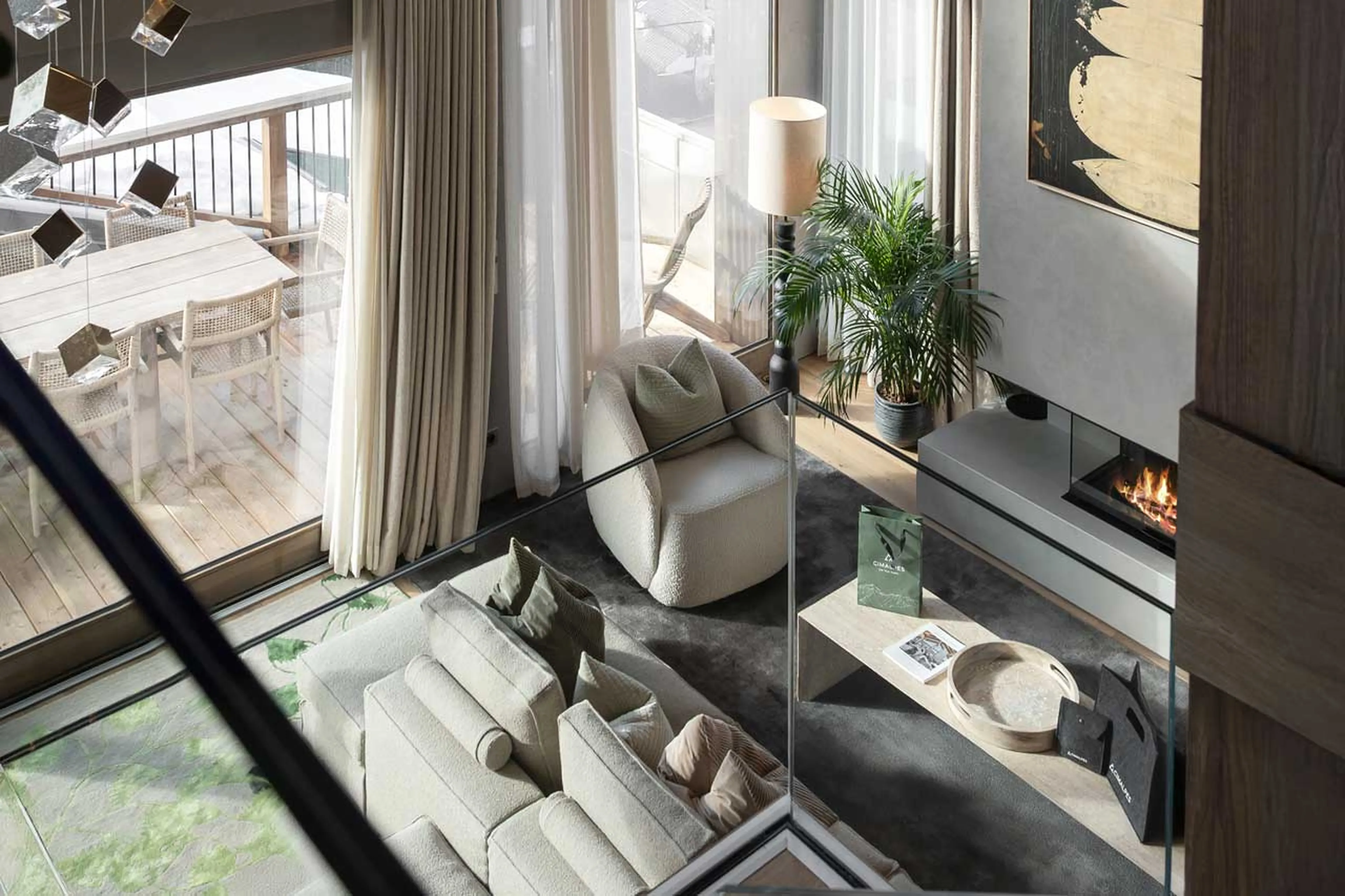 Sofa facing expansive windows in Chalet Escapade, St Martin de Belleville