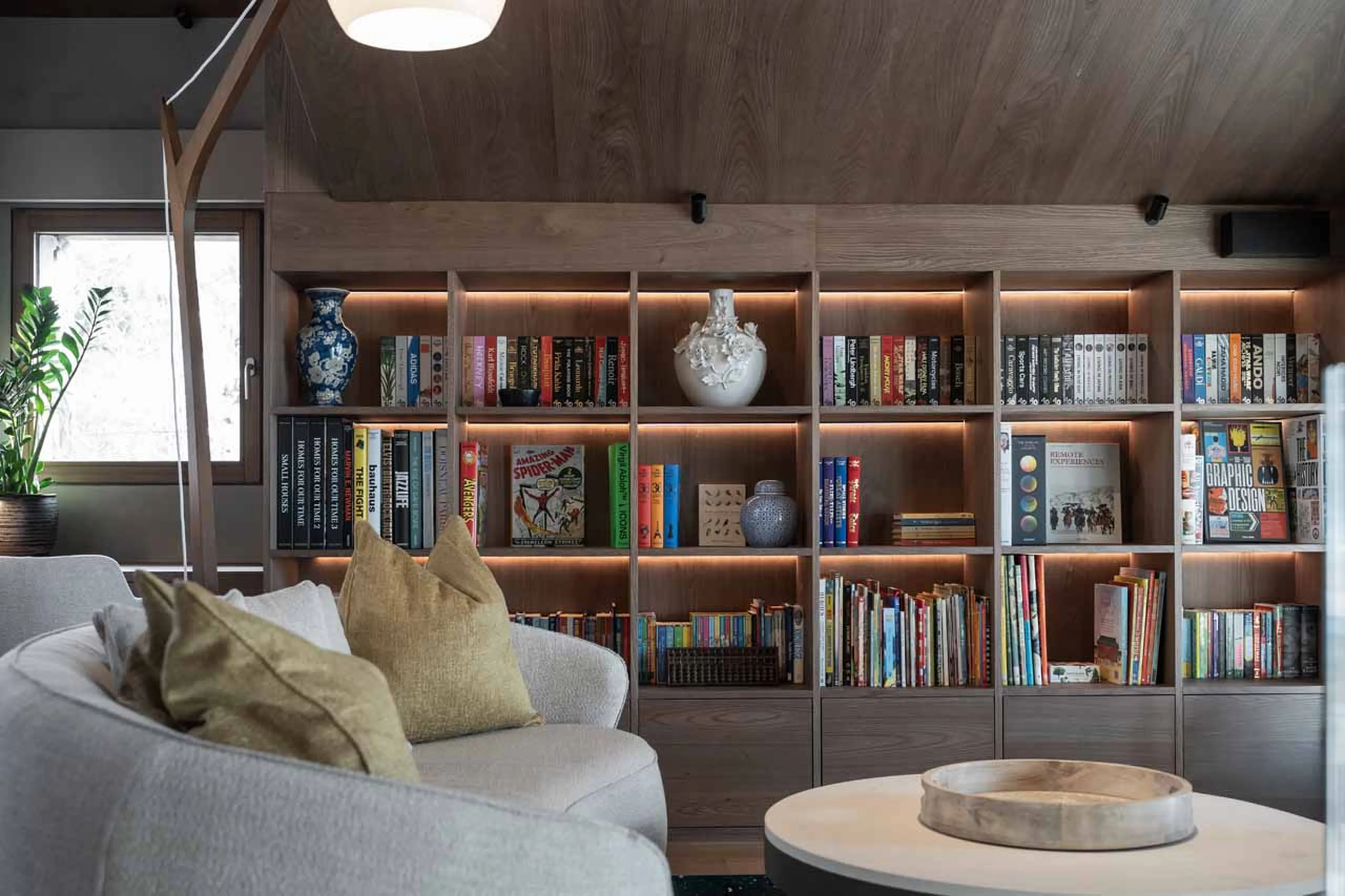 Sofa and armchairs arranged around coffee table in Chalet Escapade, St Martin de Belleville