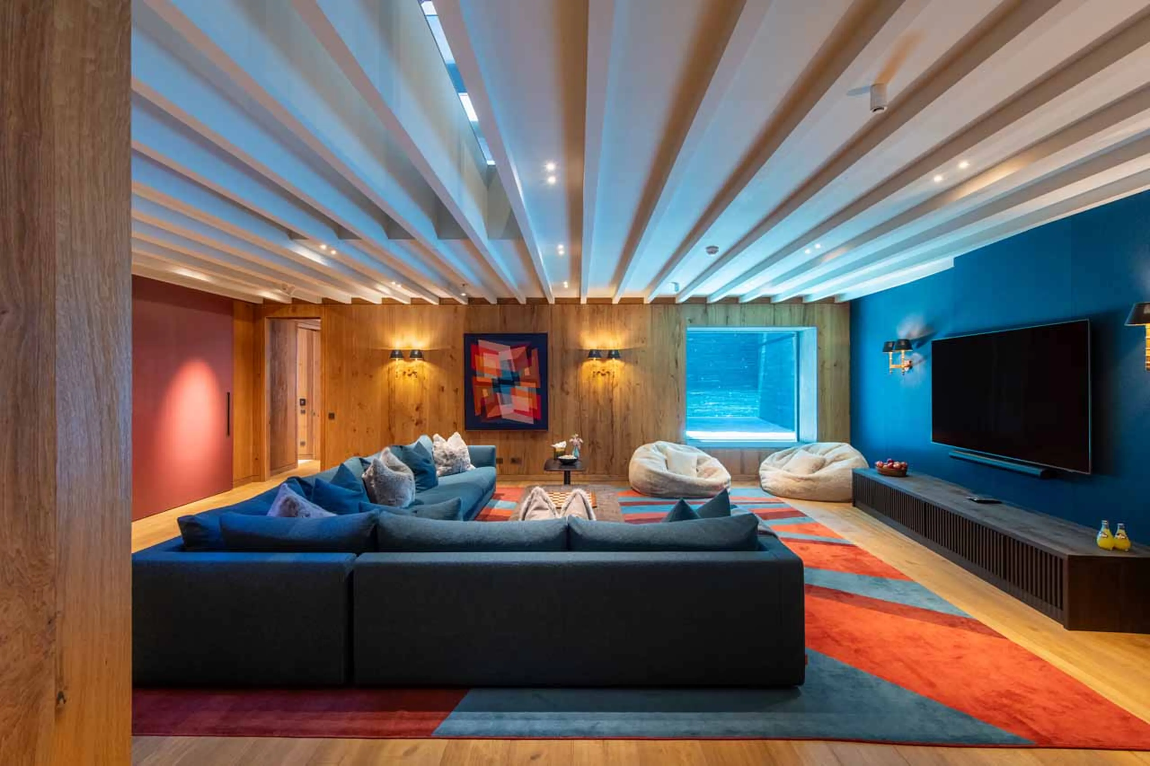 Cinema room with view of swimming pool at Chalet Etoile du Nord - East Wing in Val d'Isere