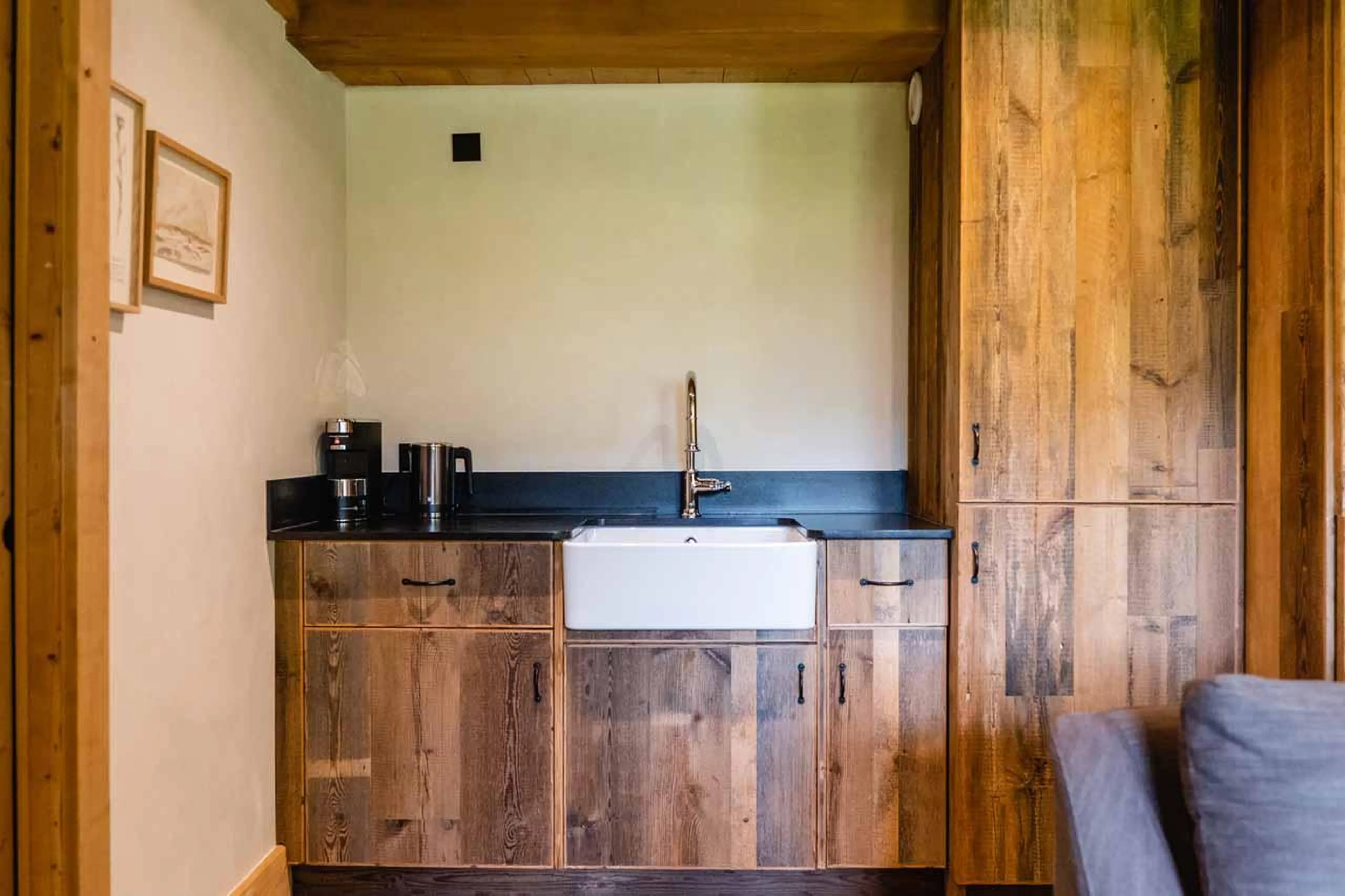 Kitchenette with wooden facade in Chalet Eustache, Megeve