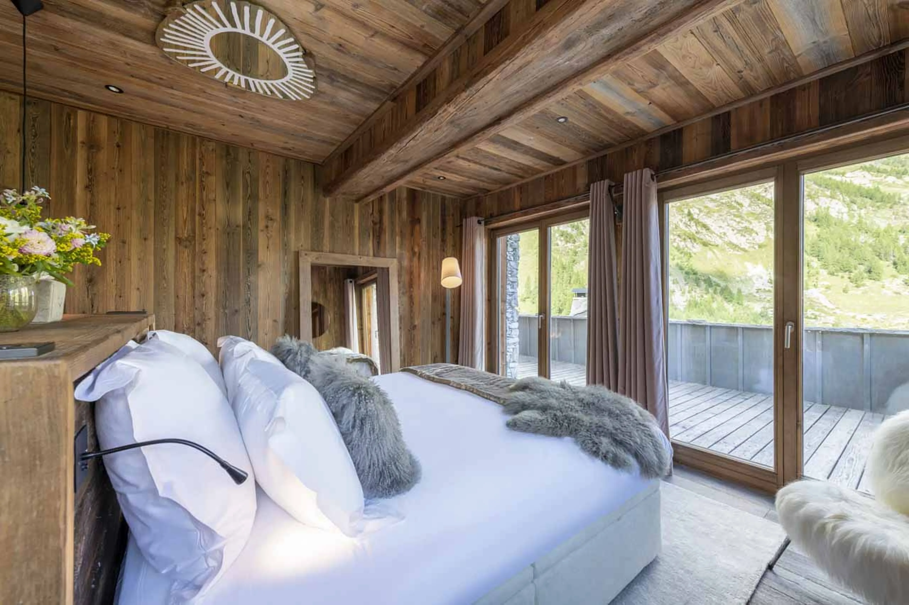 Access to terrace from master suite at Chalet Face a Face in Val d'Isere