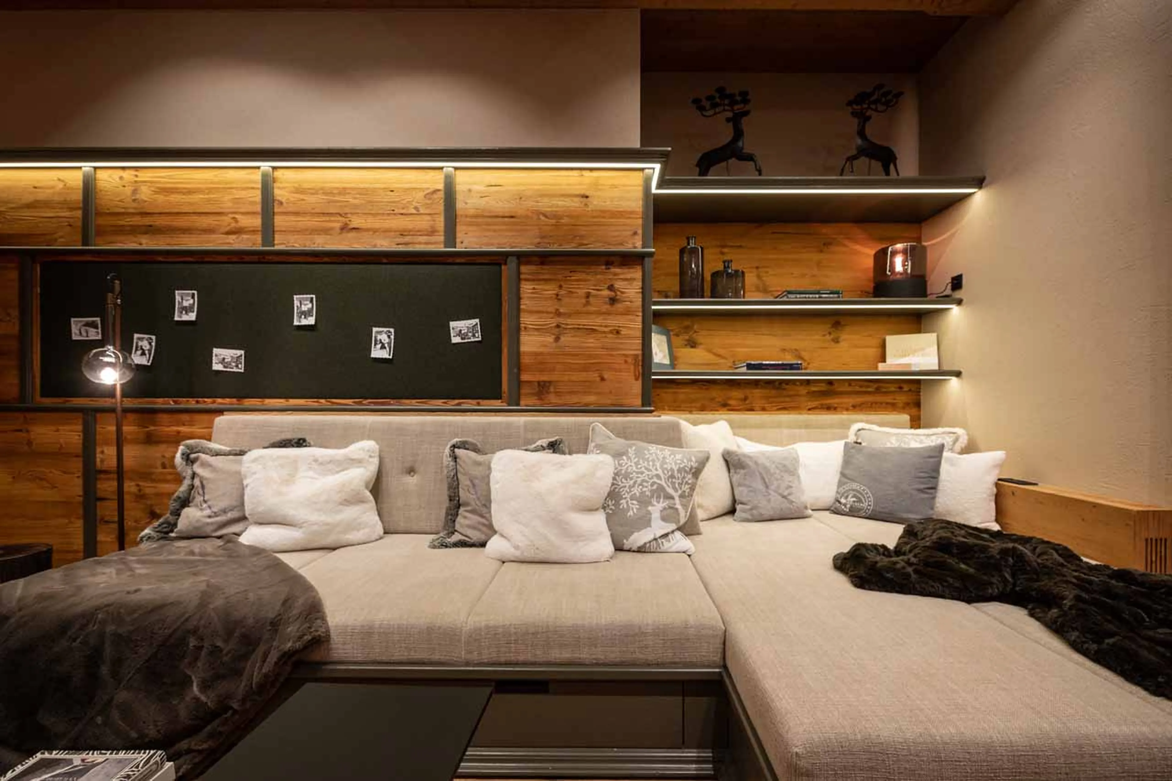 Seating area and TV in living area at Chalet Falcon in Lech