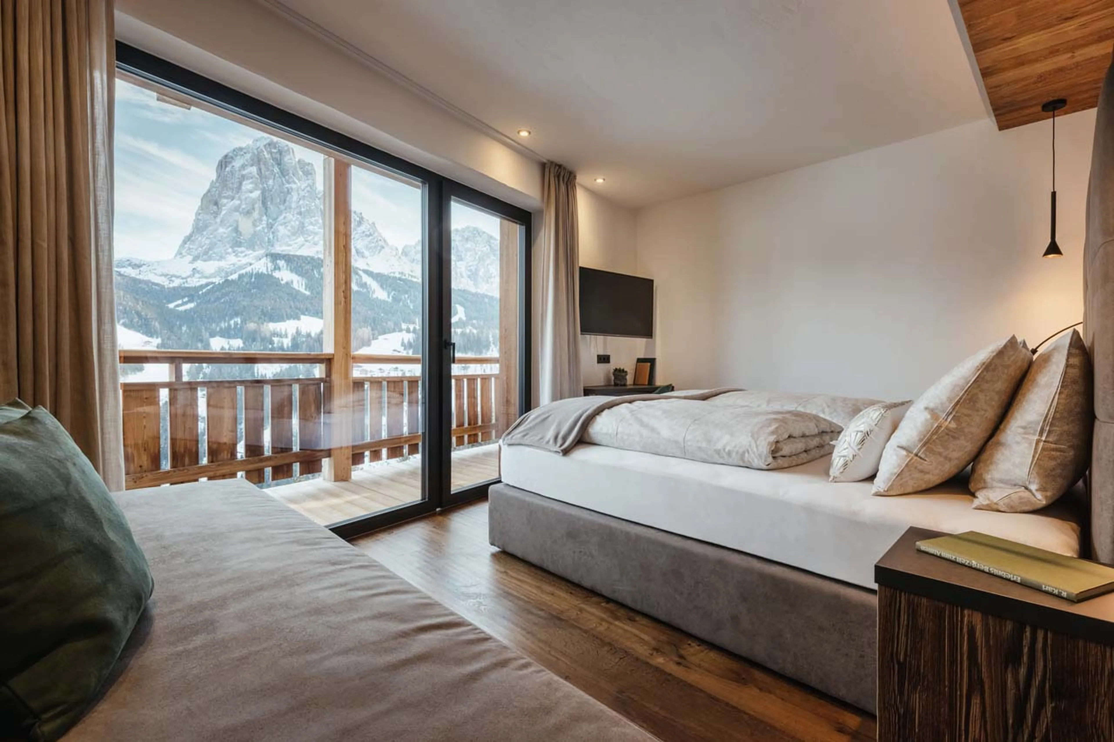 Double bedroom with balcony access in Chalet Filip, Val Gardena