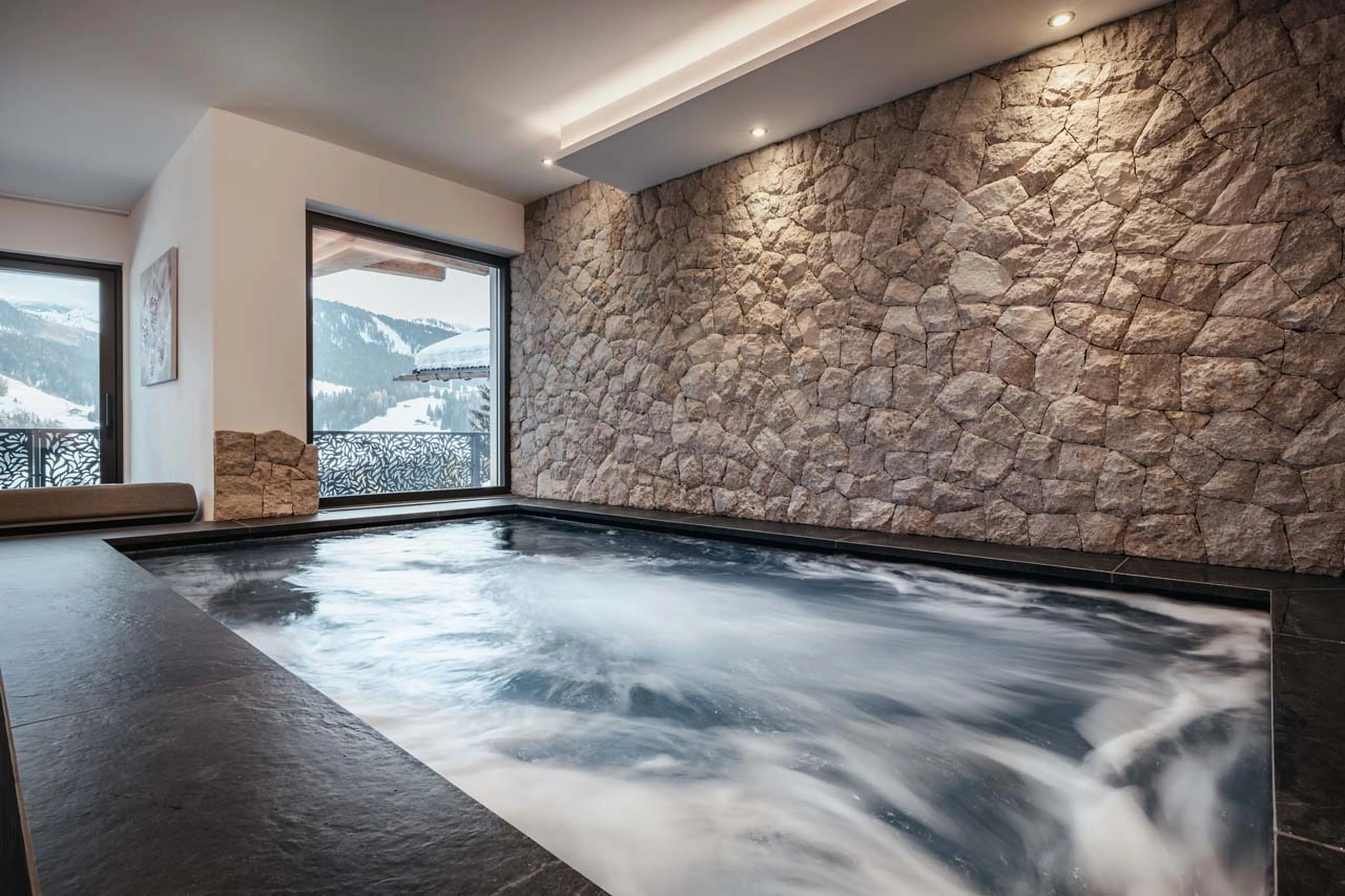 Swimming pool with integrated whirlpool in Chalet Filip, Val Gardena