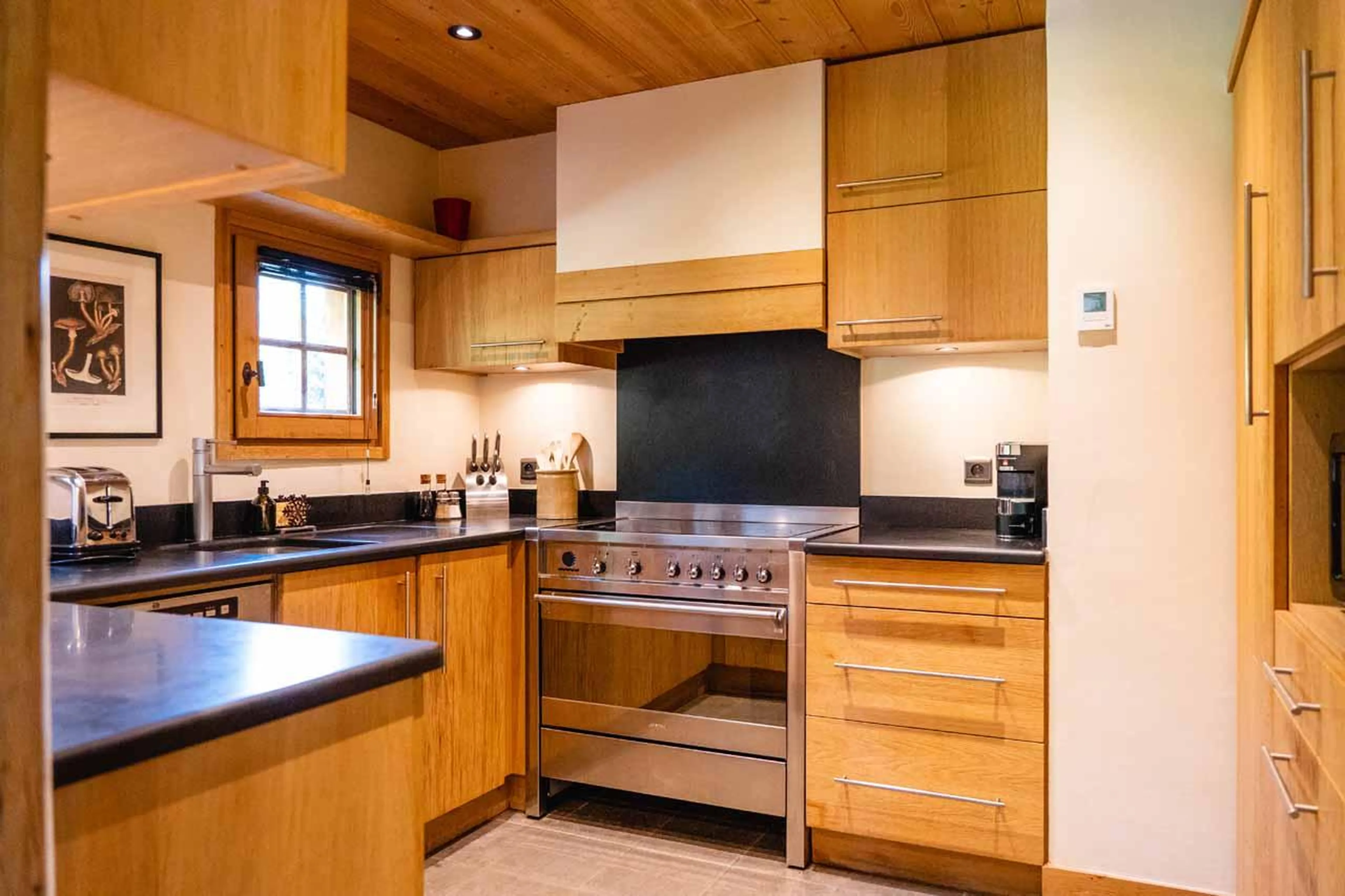 Kitchen with wooden facade in Chalet Firmin, Megeve
