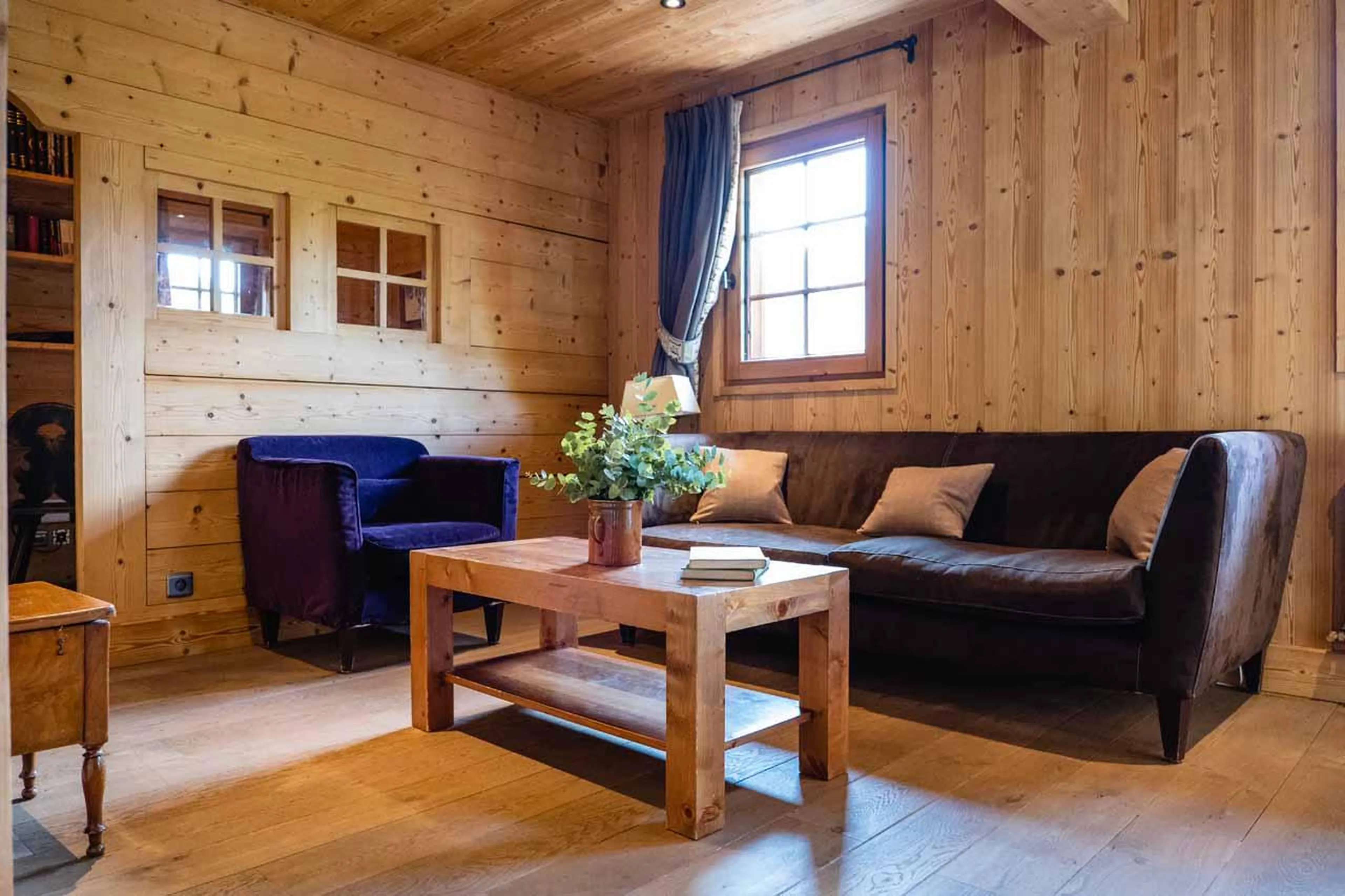 Reading corner with sofas and coffee table in Chalet Firmin, Megeve