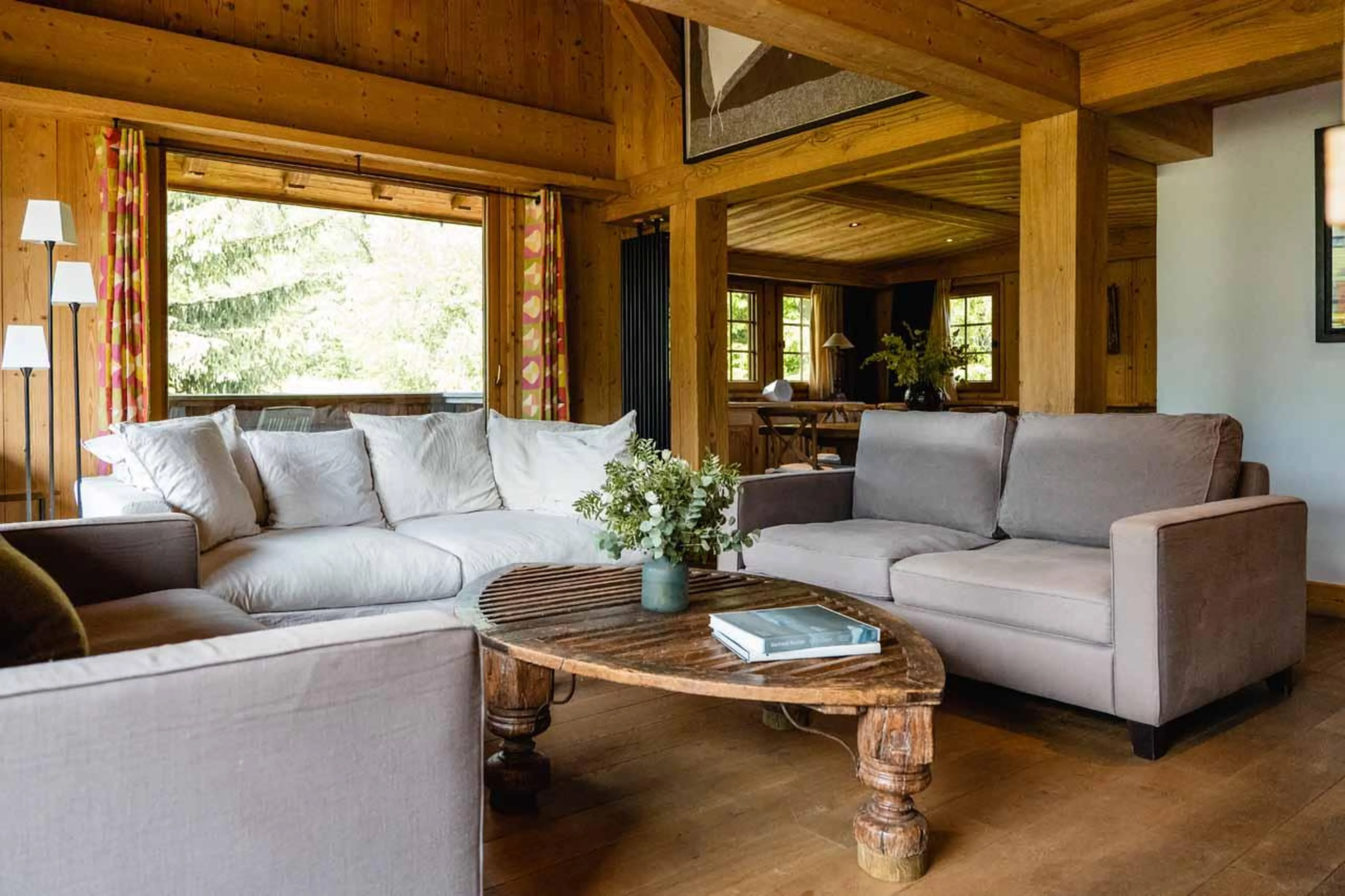 Sofas set around a coffee table in Chalet Firmin, Megeve