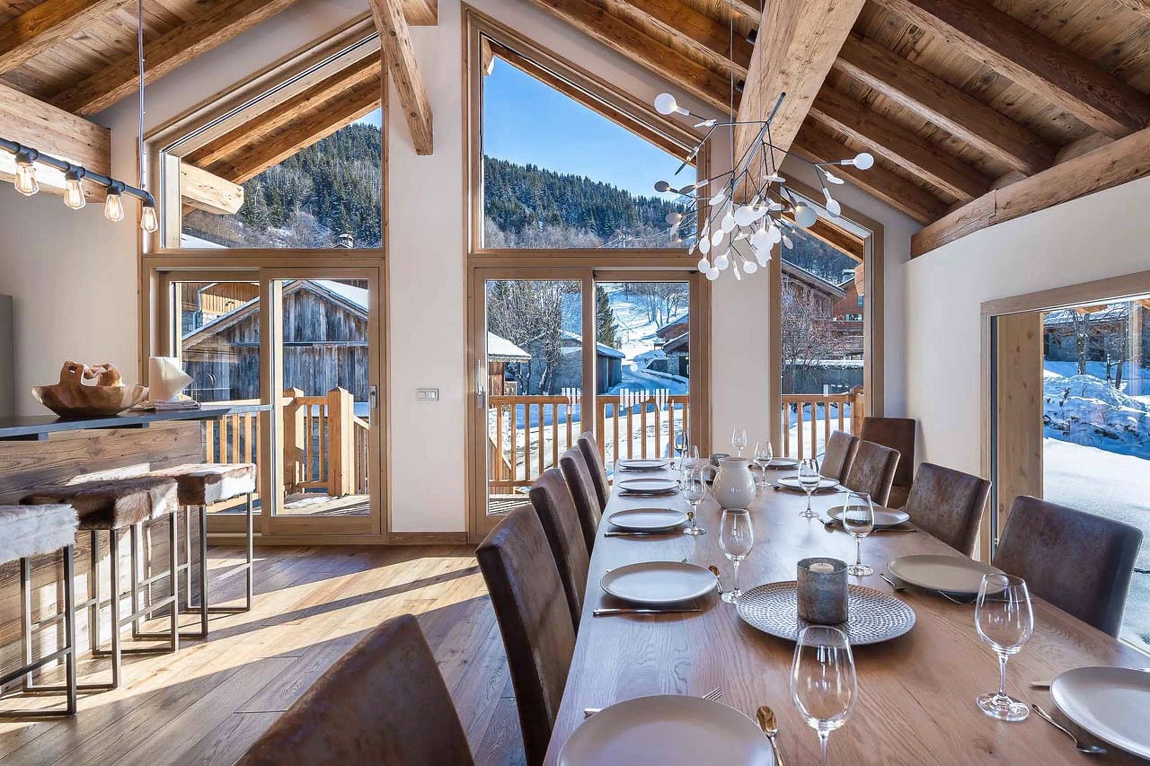 Dining table and breakfast bar at Chalet Fontany in Meribel