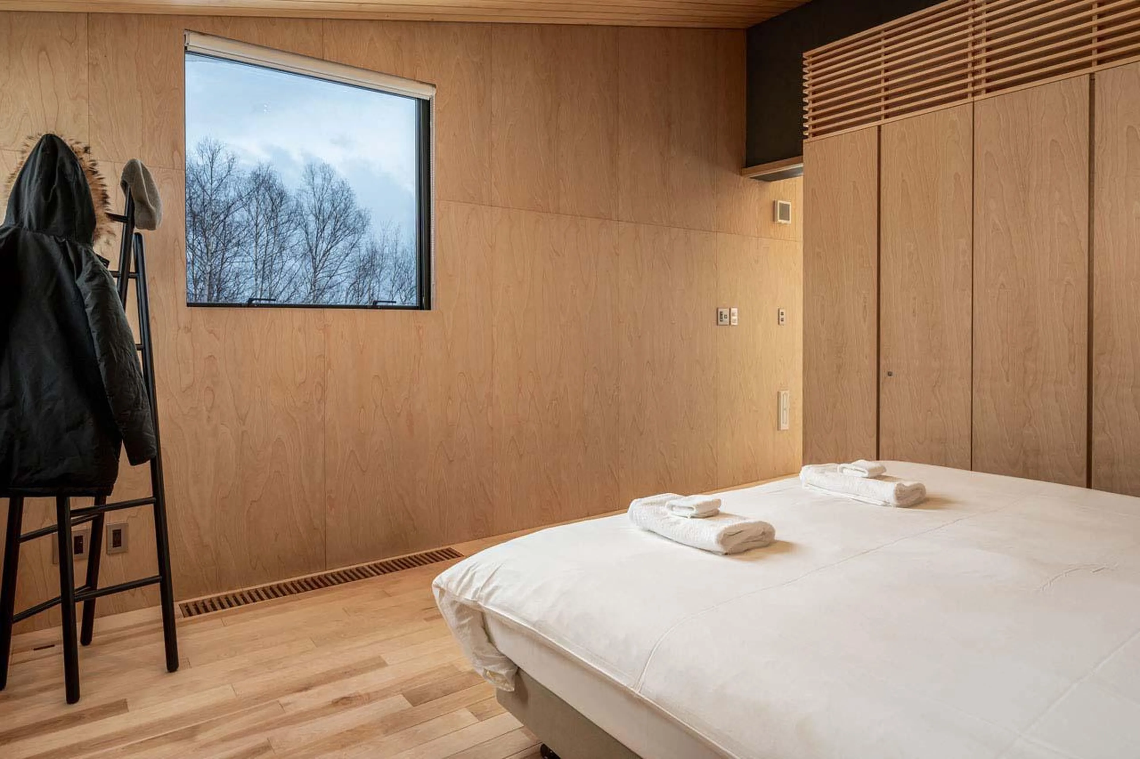 Bedroom with plentiful wardrobe storage at Chalet Foxwood B in Niseko