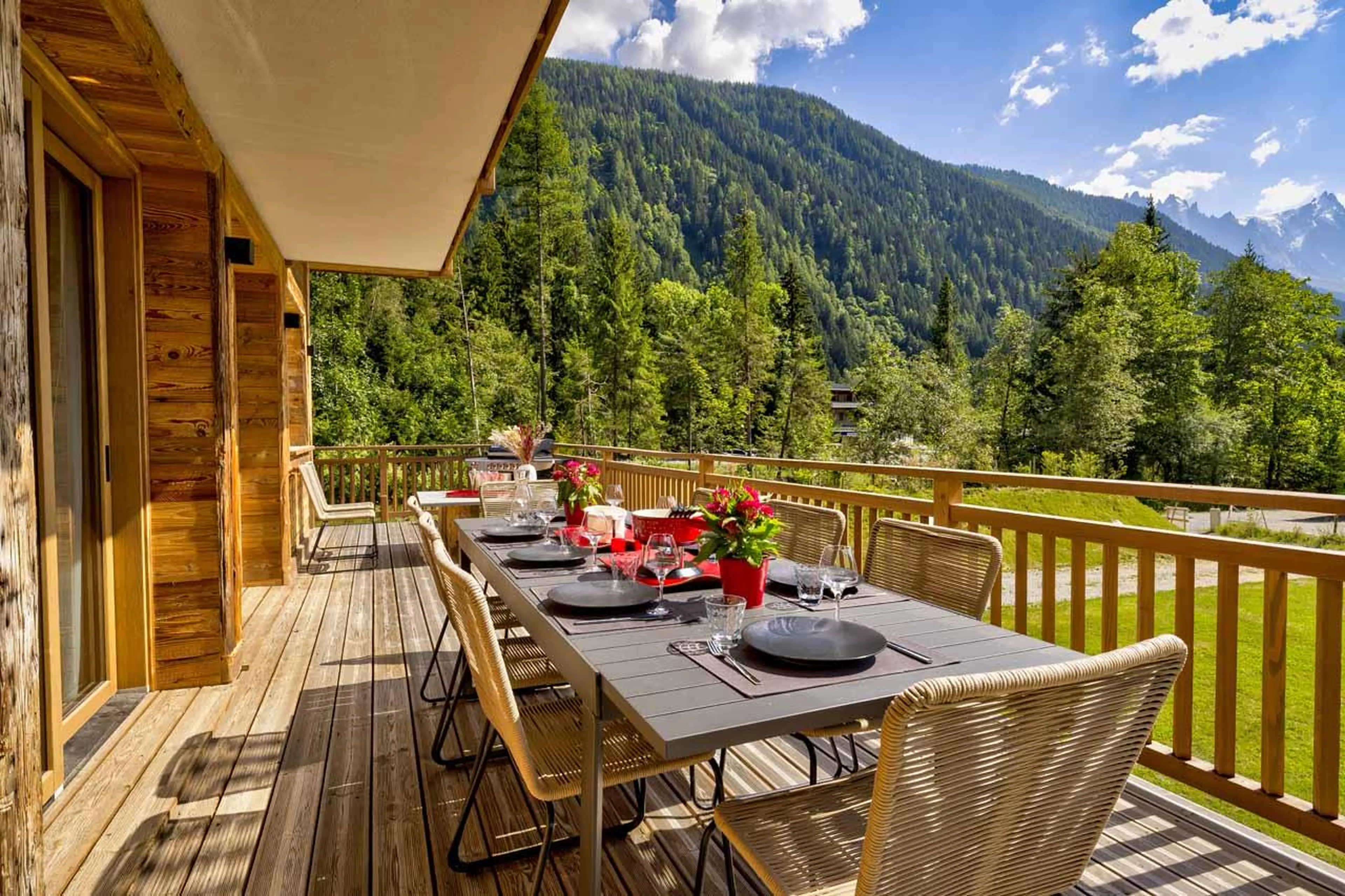 Outdoor dining table on terrace at Chalet Freya in Chamonix