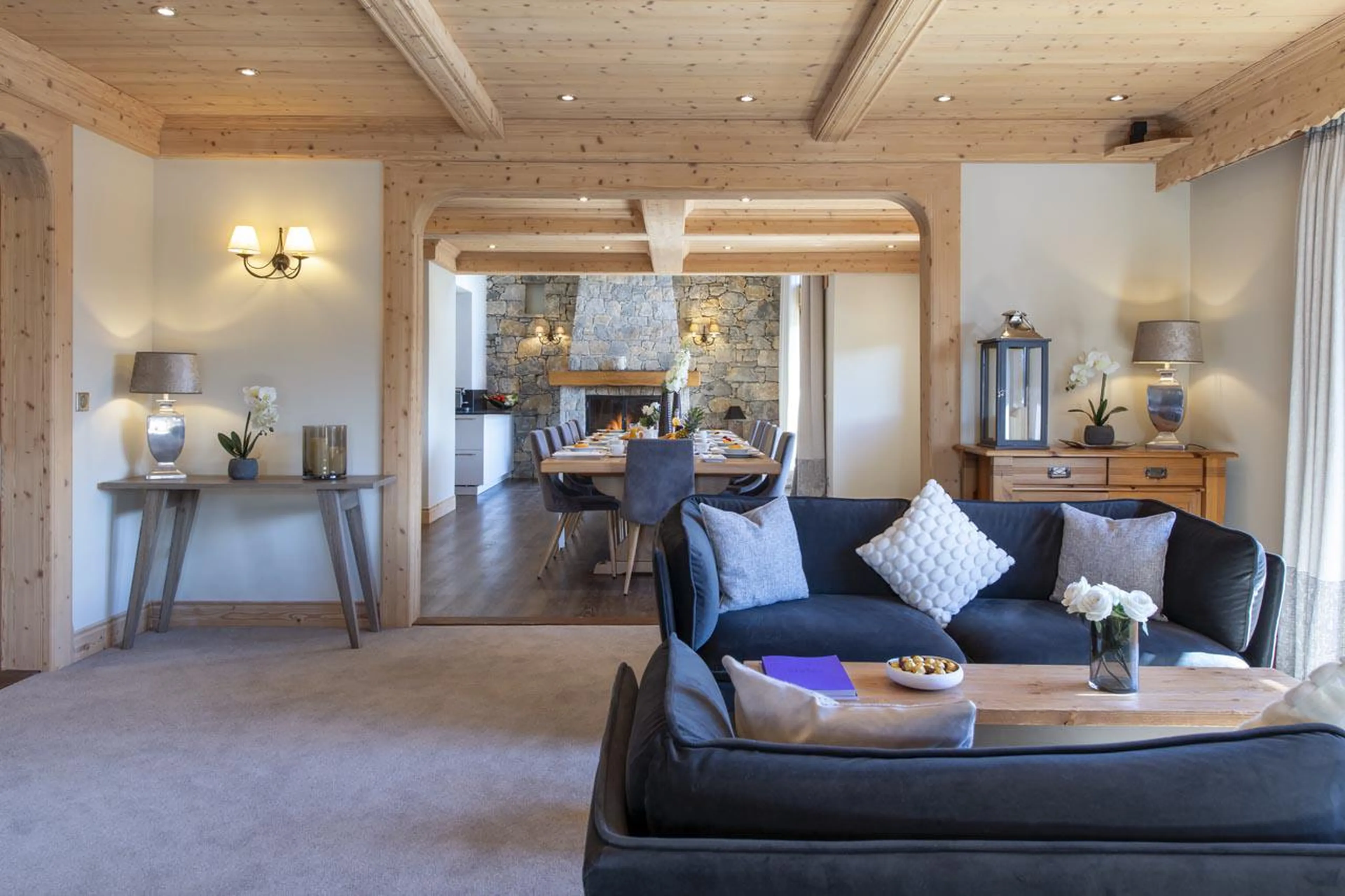 Cosy seating area flooded by natural light at Chalet Genepi in Meribel