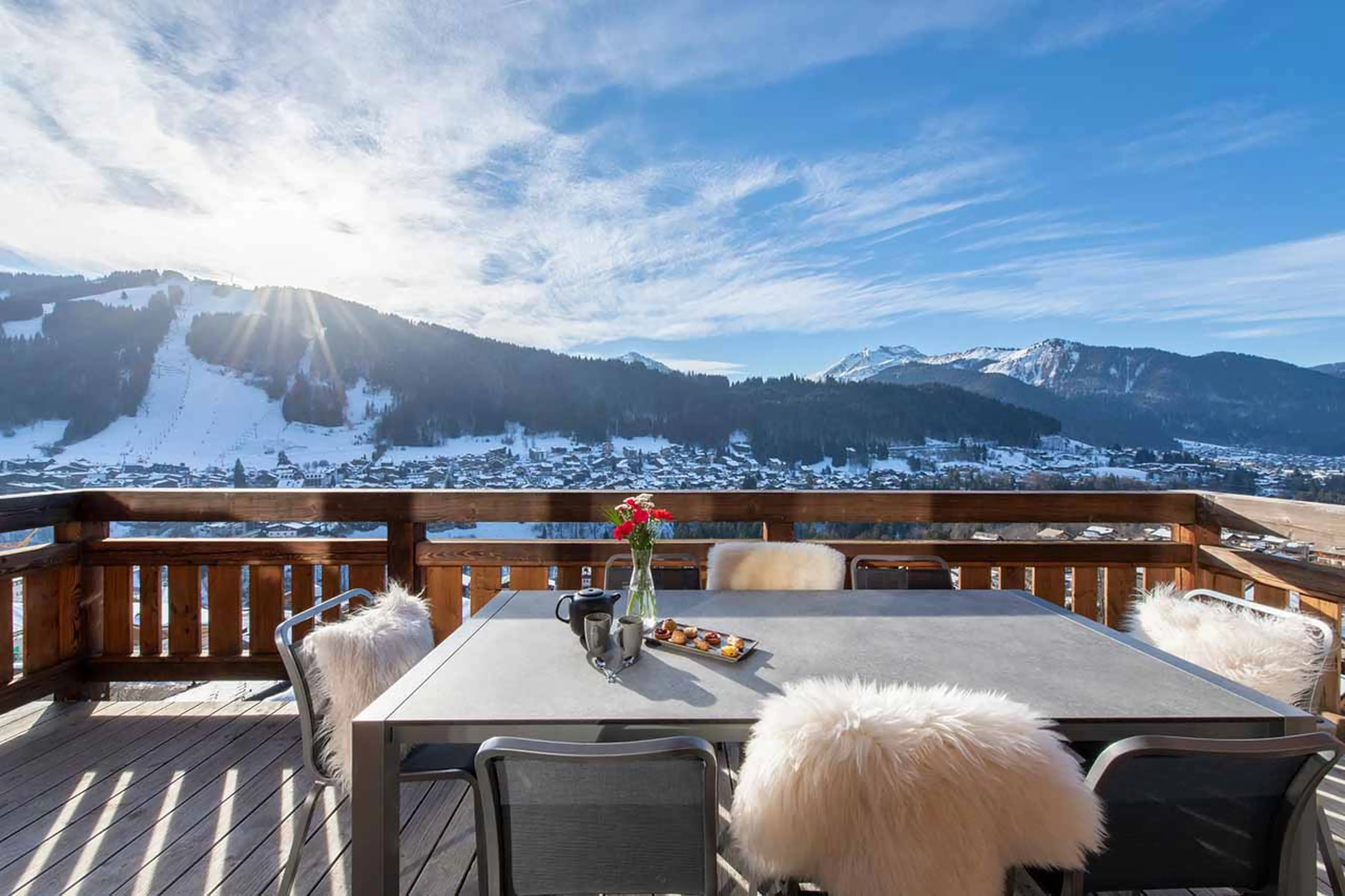 Terrace with dining at Chalet Goldilocks in Morzine