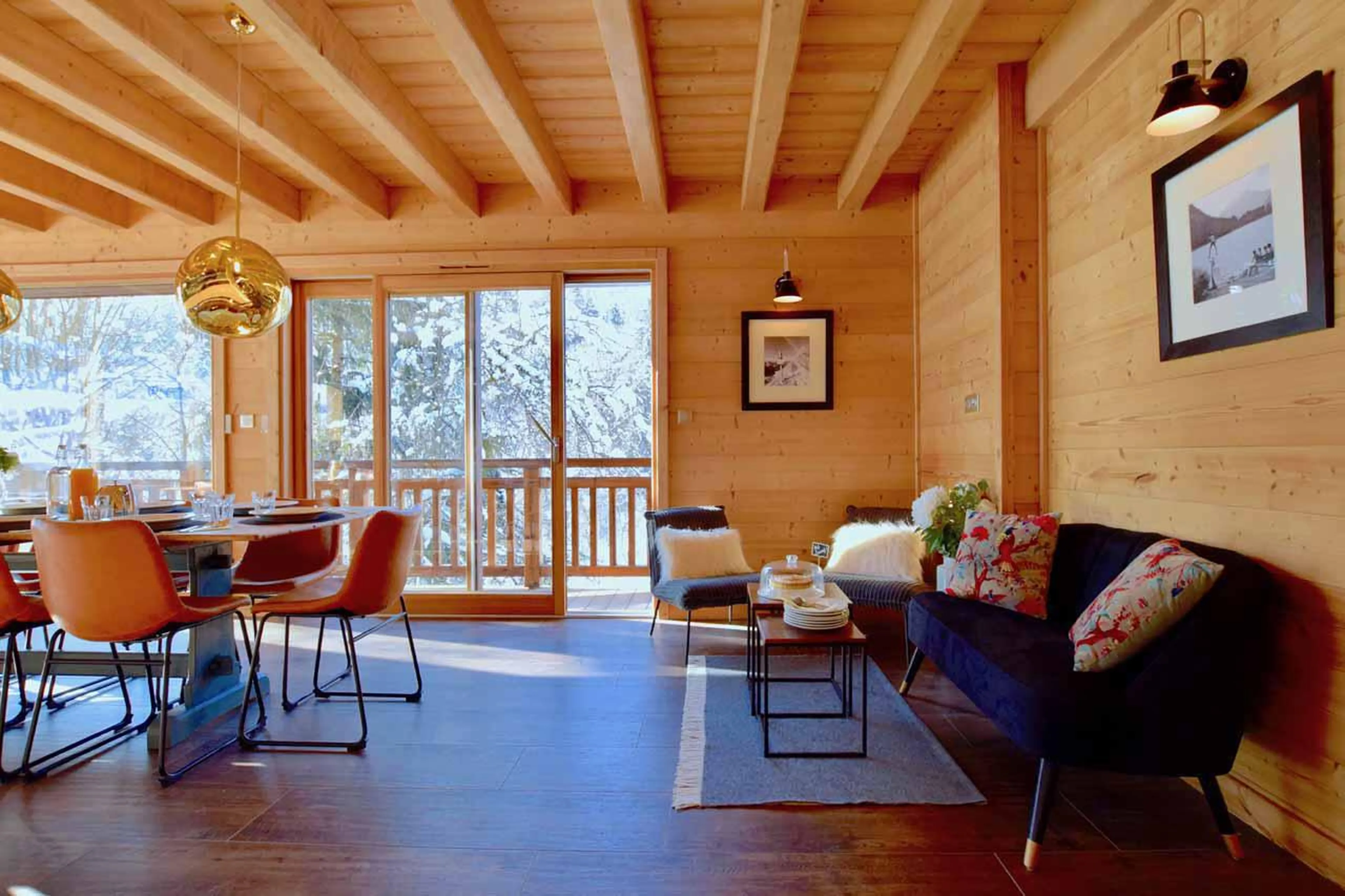 Sofa in dining area at Chalet Gouter in Morzine