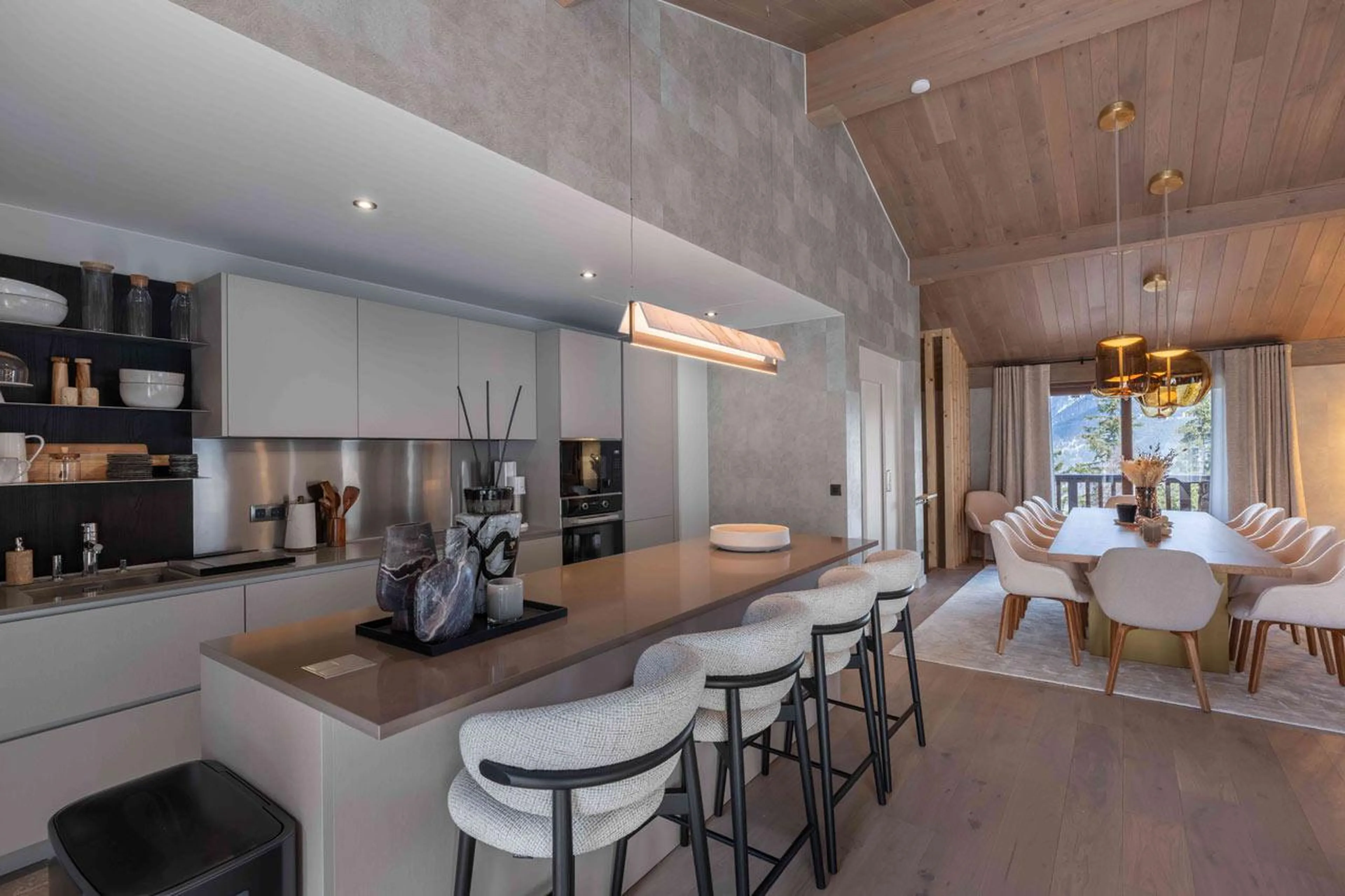 Kitchen with island and high seating in Chalet Goyard, Courchevel 1650