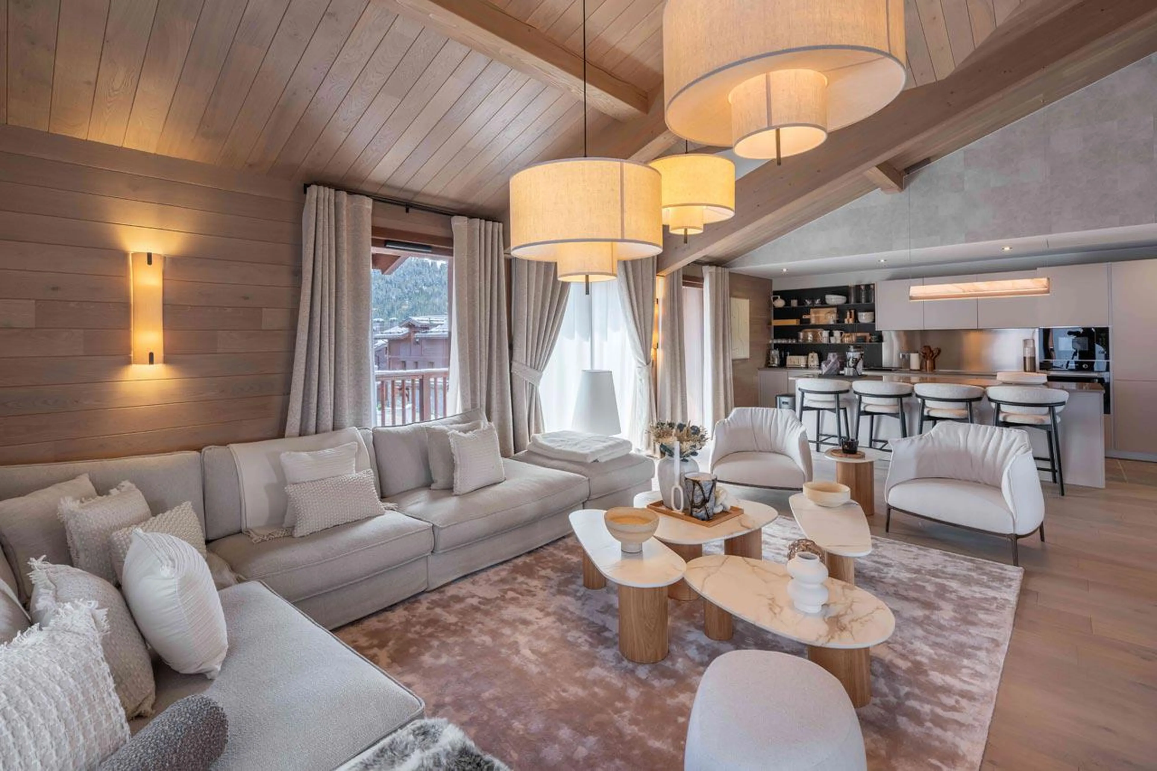 Wrap-around sofa and coffee table in Chalet Goyard, Courchevel 1650