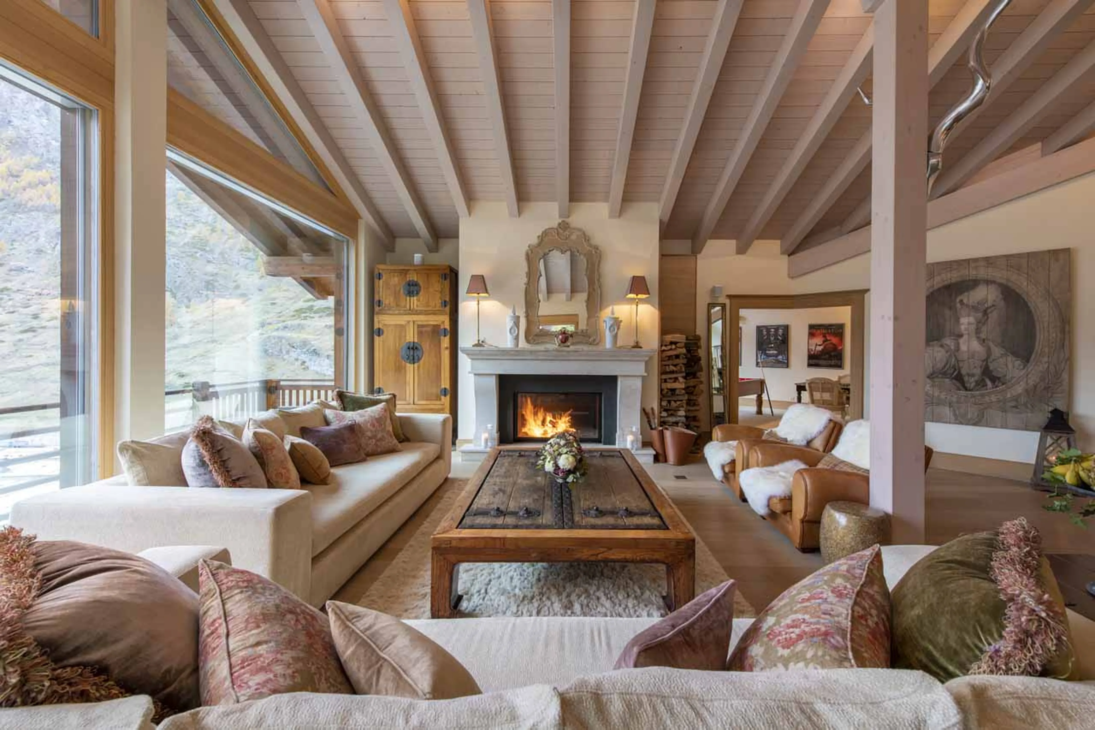 Fireplace in living room at Chalet Grace in Zermatt