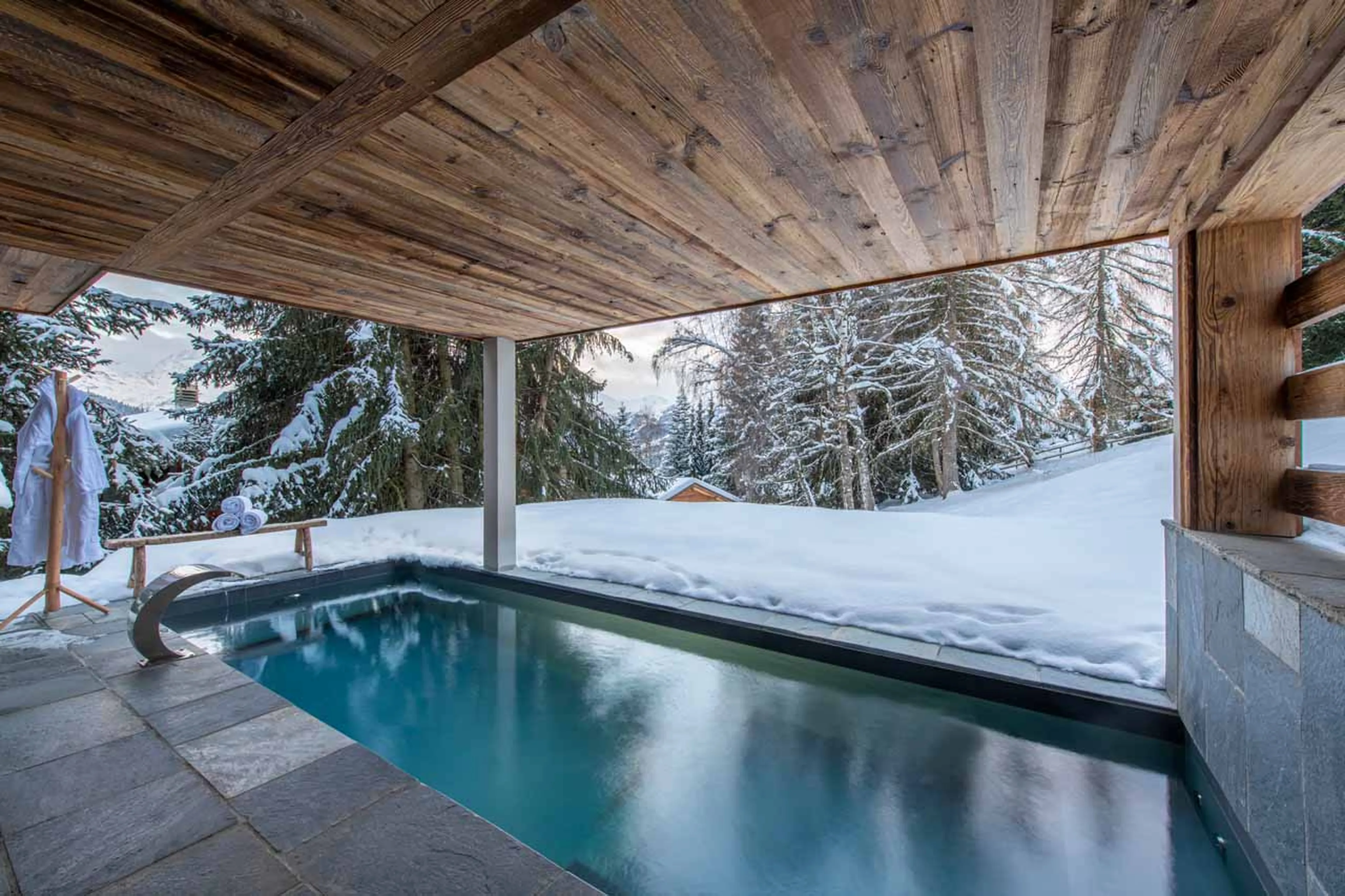 Outdoor pool in the winter at Chalet Grand Coeur in Verbier