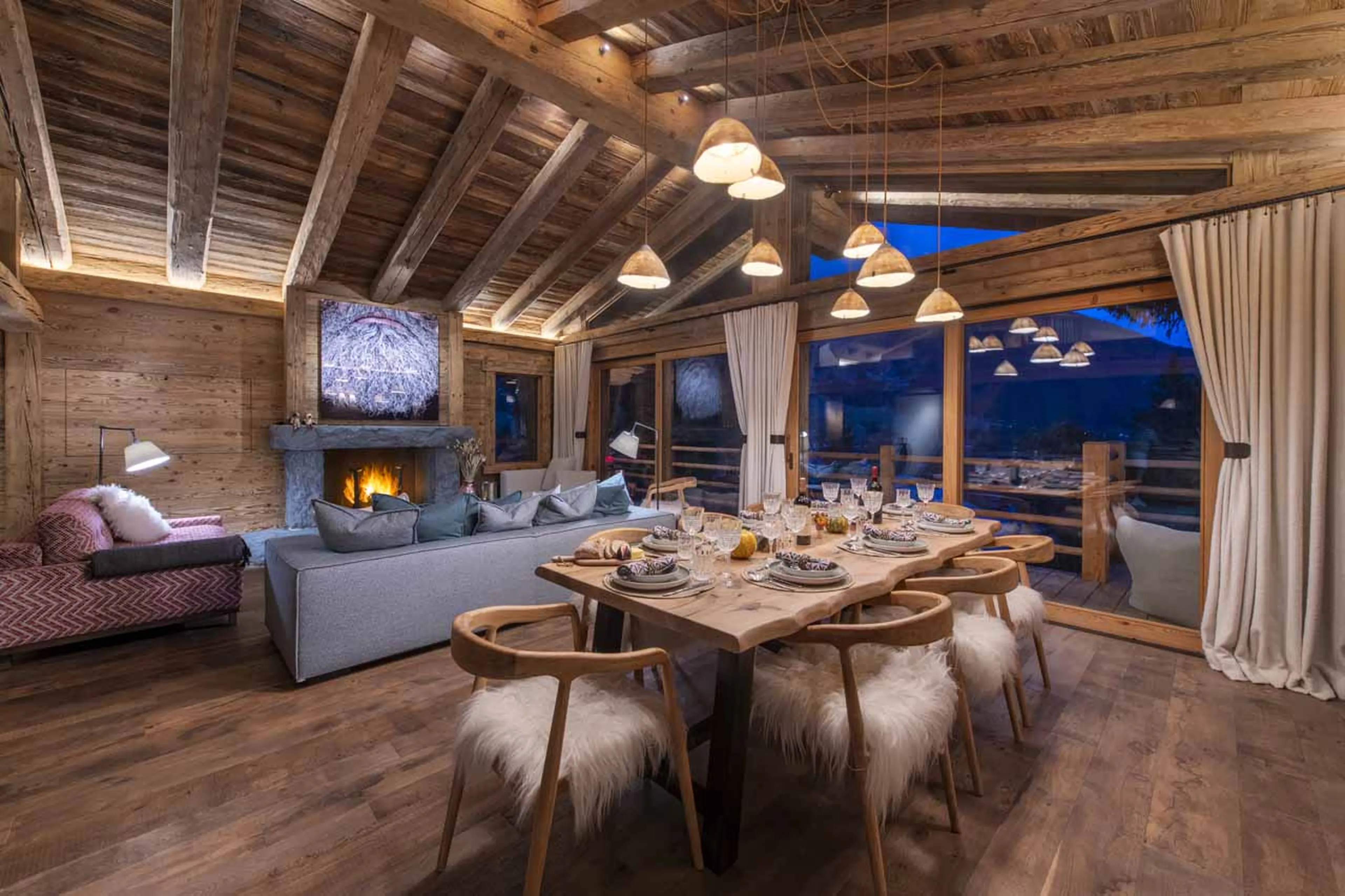 Living area at Chalet Grand Coeur in Verbier at night