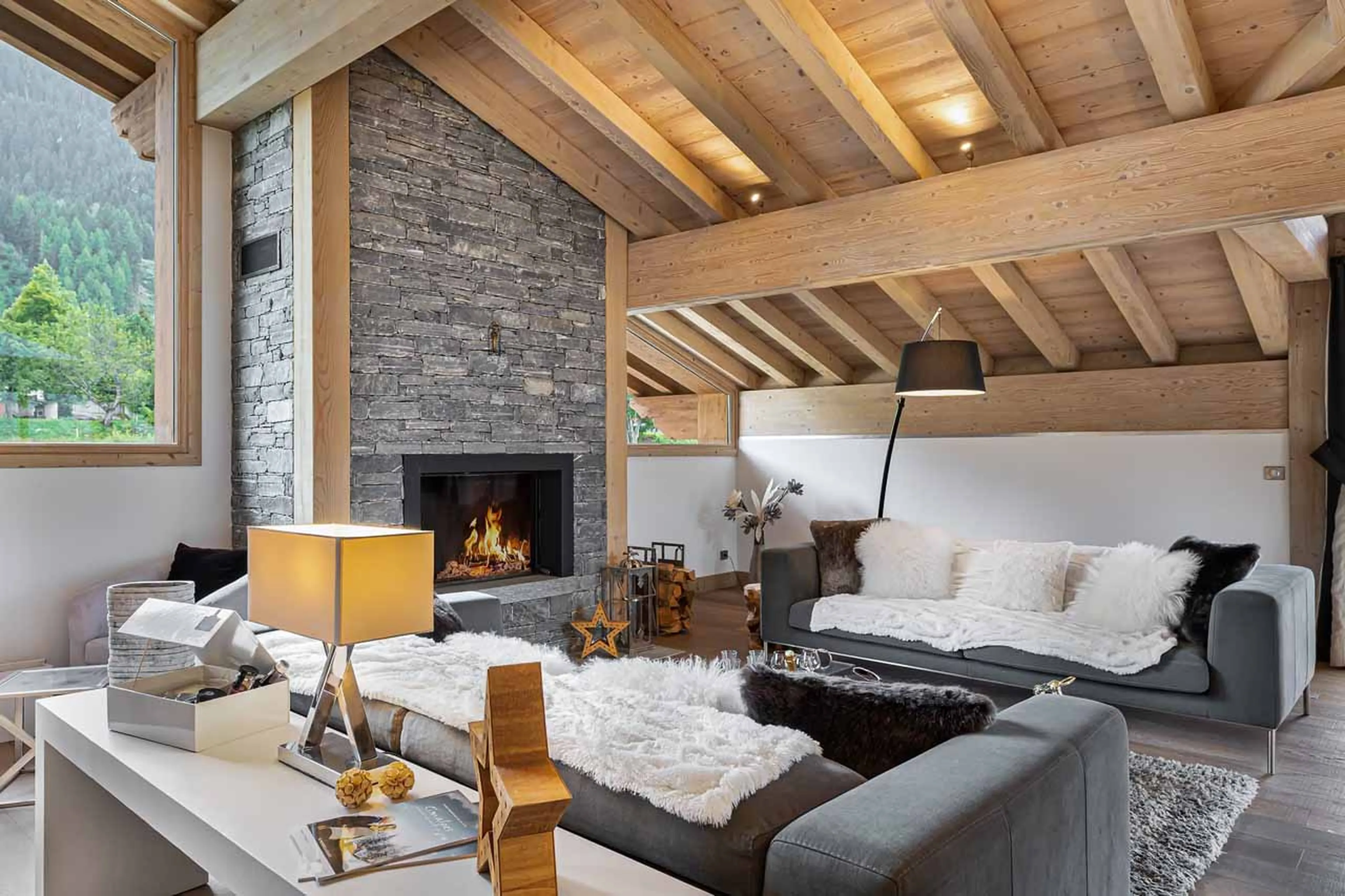 Inviting sofas in living area of Chalet Grand Tetras at Courchevel Le Praz