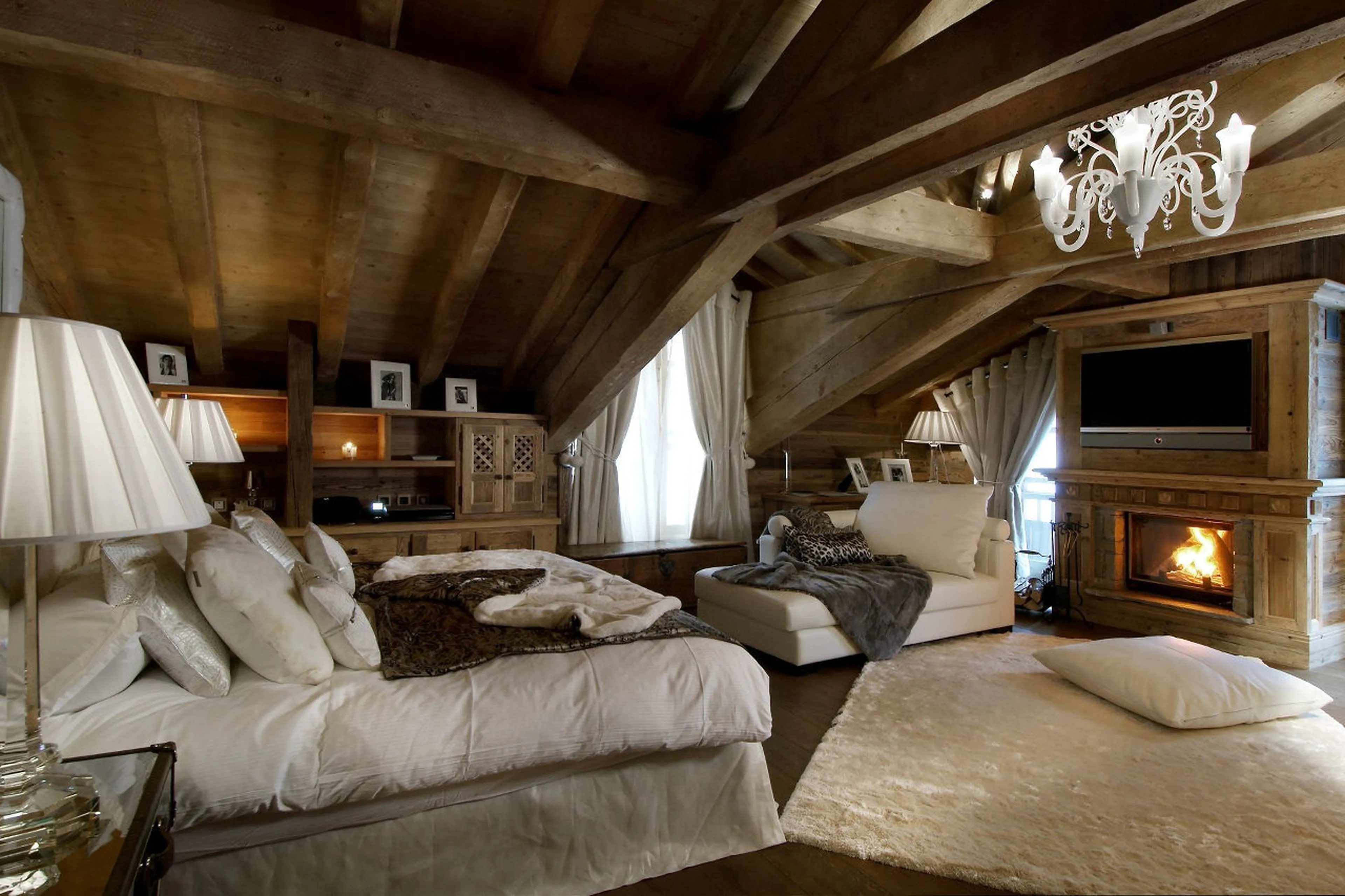 Master double bedroom with fireplace in Chalet La Grande Roche in Courchevel 1850