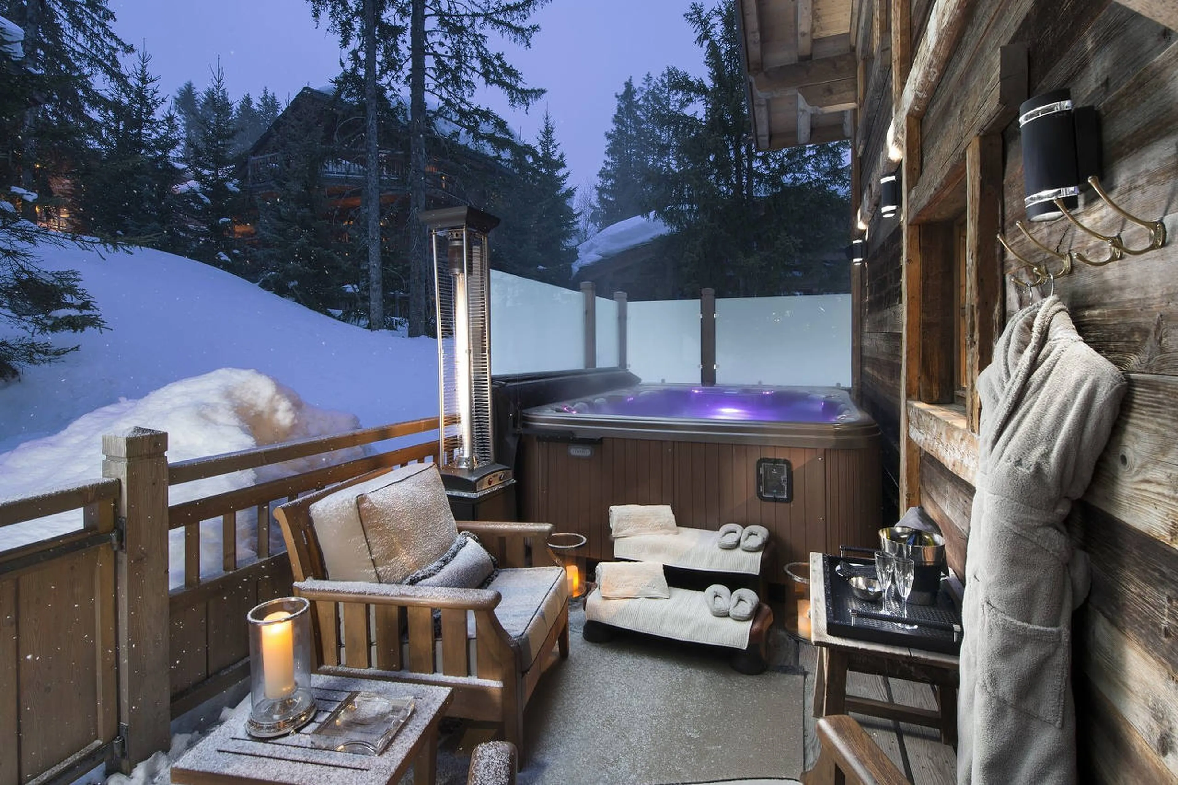 Outdoor Jacuzzi on the east-facing terrace of Chalet La Grand Roche in Courchevel 1850