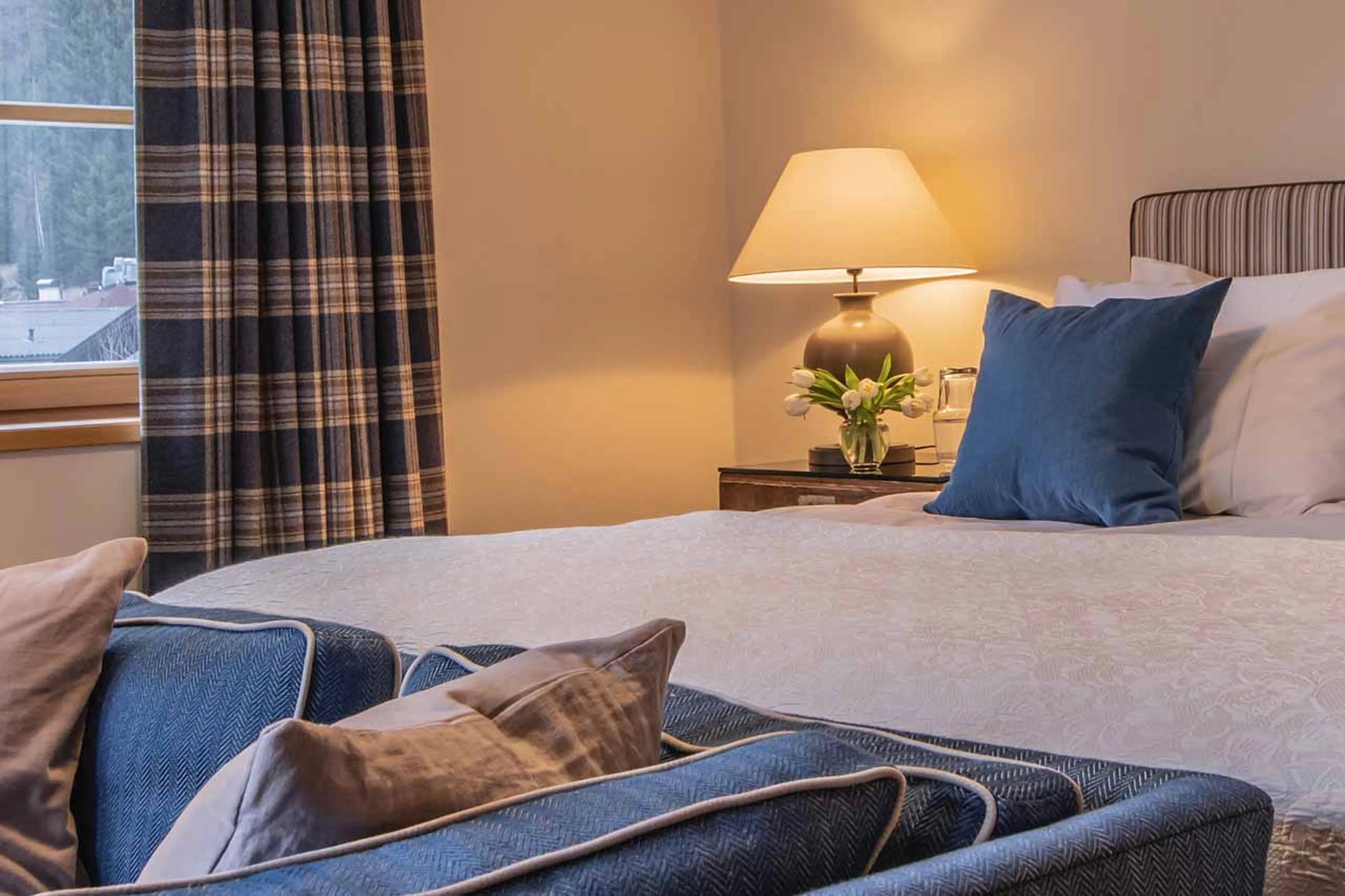 Double bed in bedroom two at Chalet Griffin in St Anton