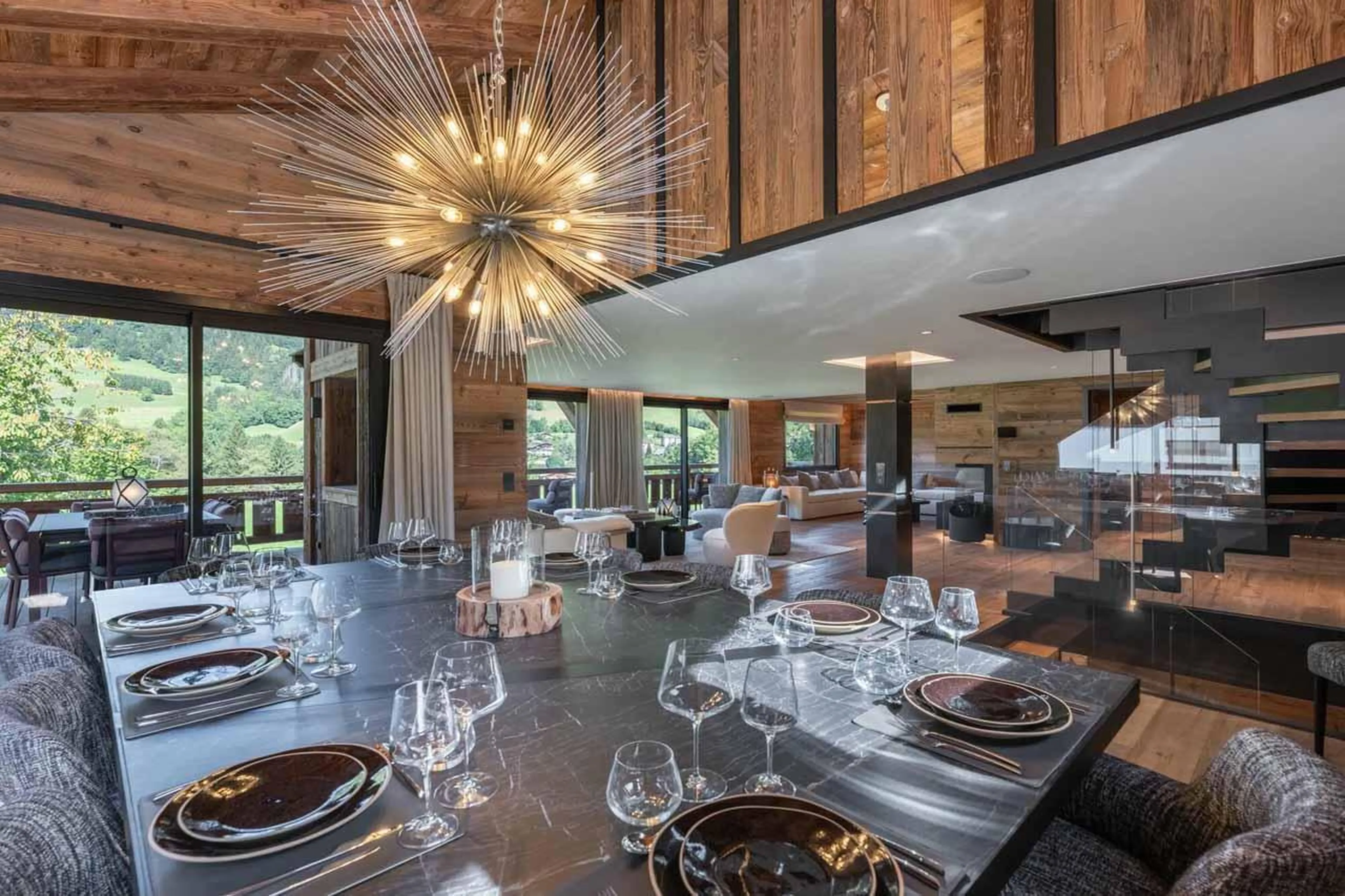 Dining table with modern lighting in Chalet Grizzly, Megeve