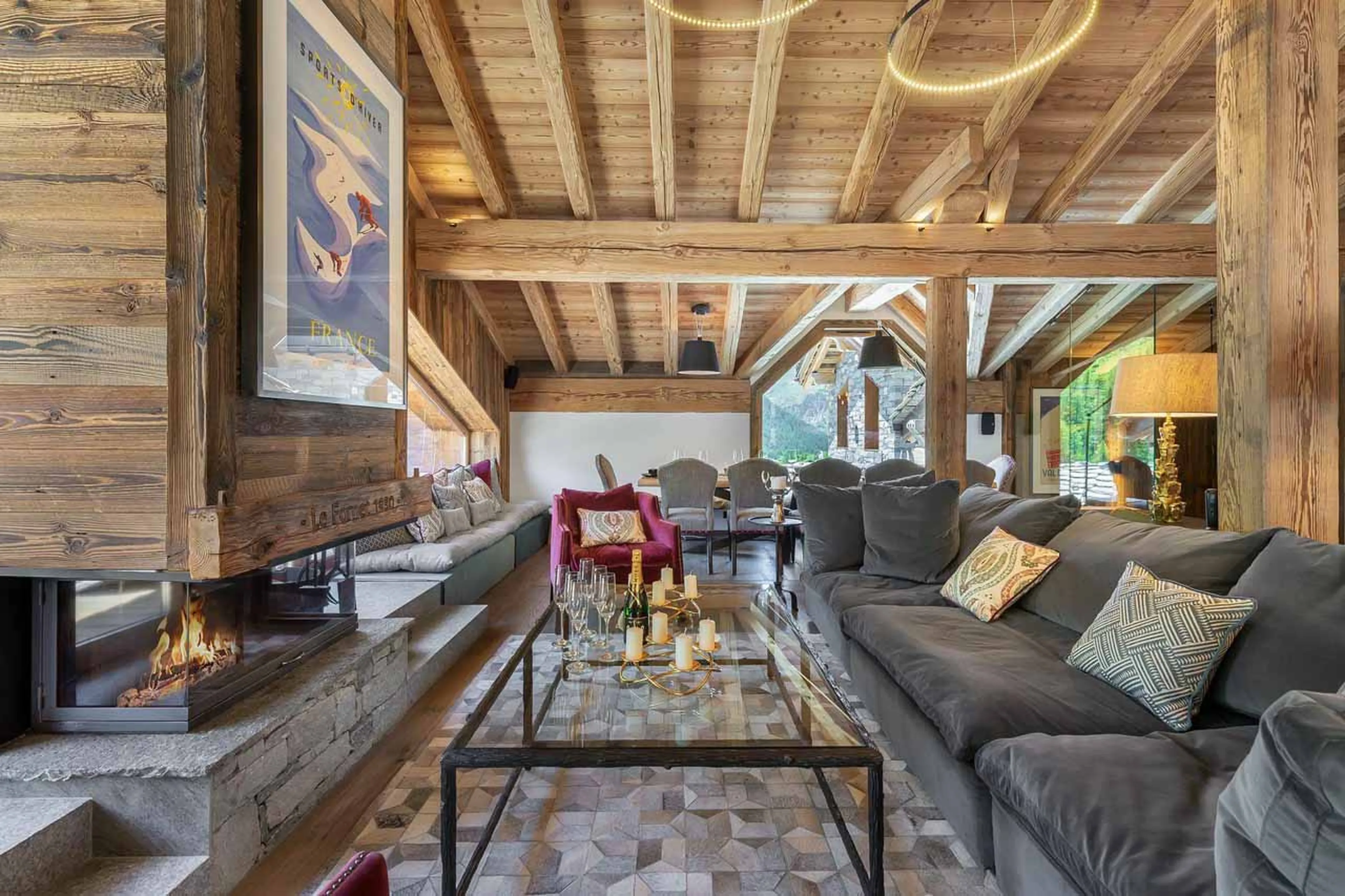 Fireplace in living area of Chalet Hermine Blanche in Val d'Isere