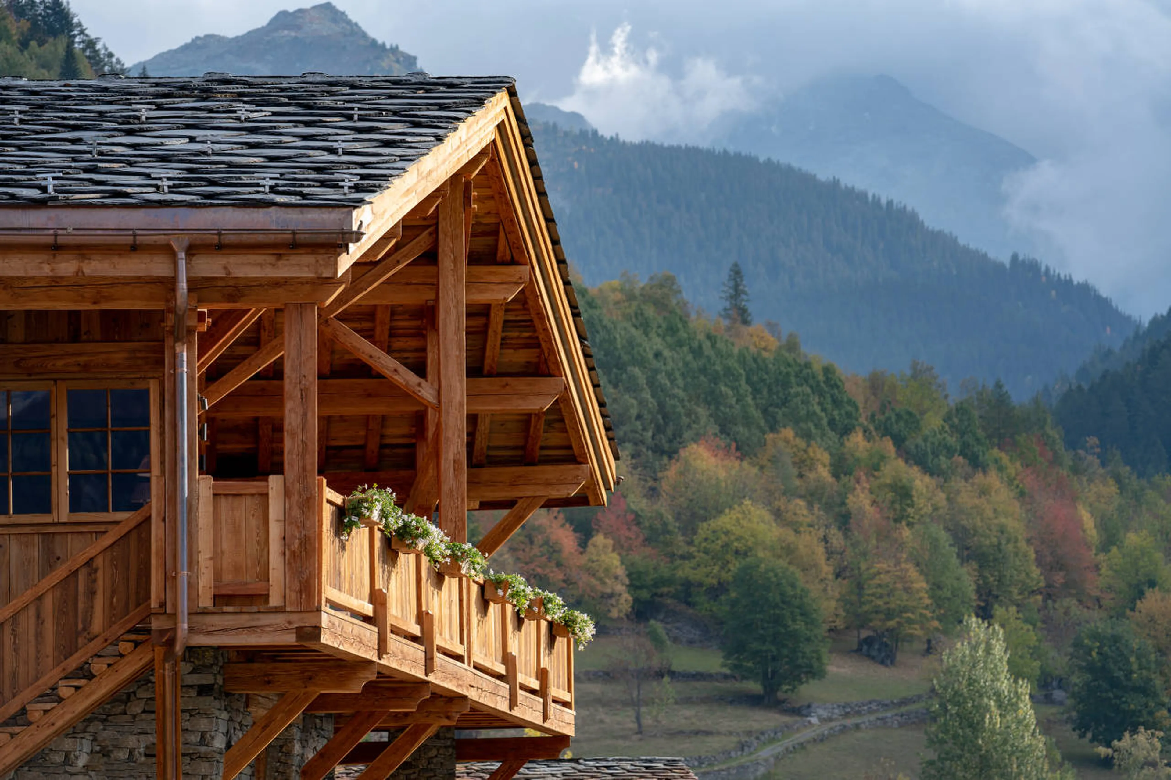 Balcony and view in summer at Chalet Hibou in Le Miroir