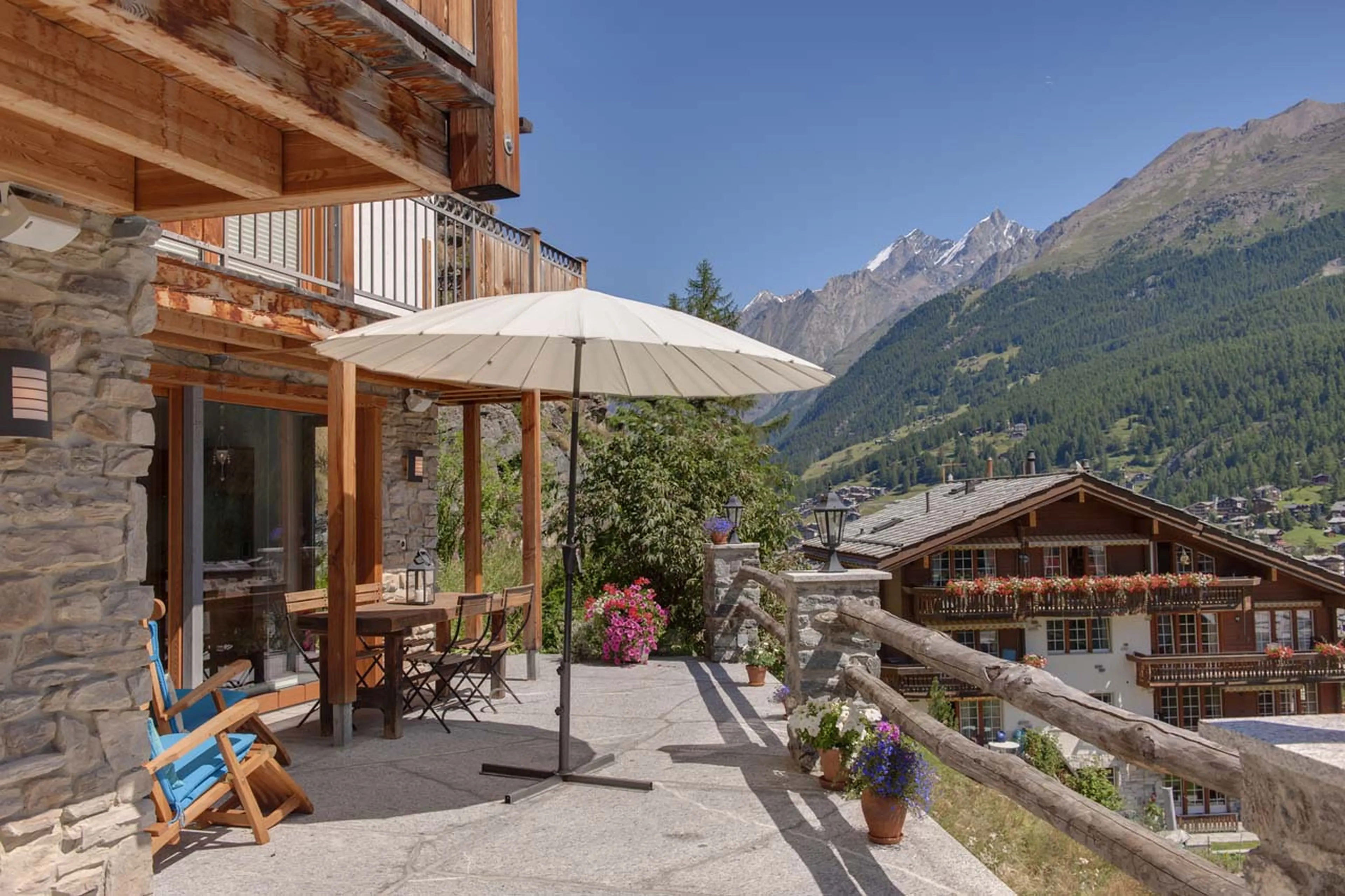 Terrace in summer of Chalet Ibron in Zermatt