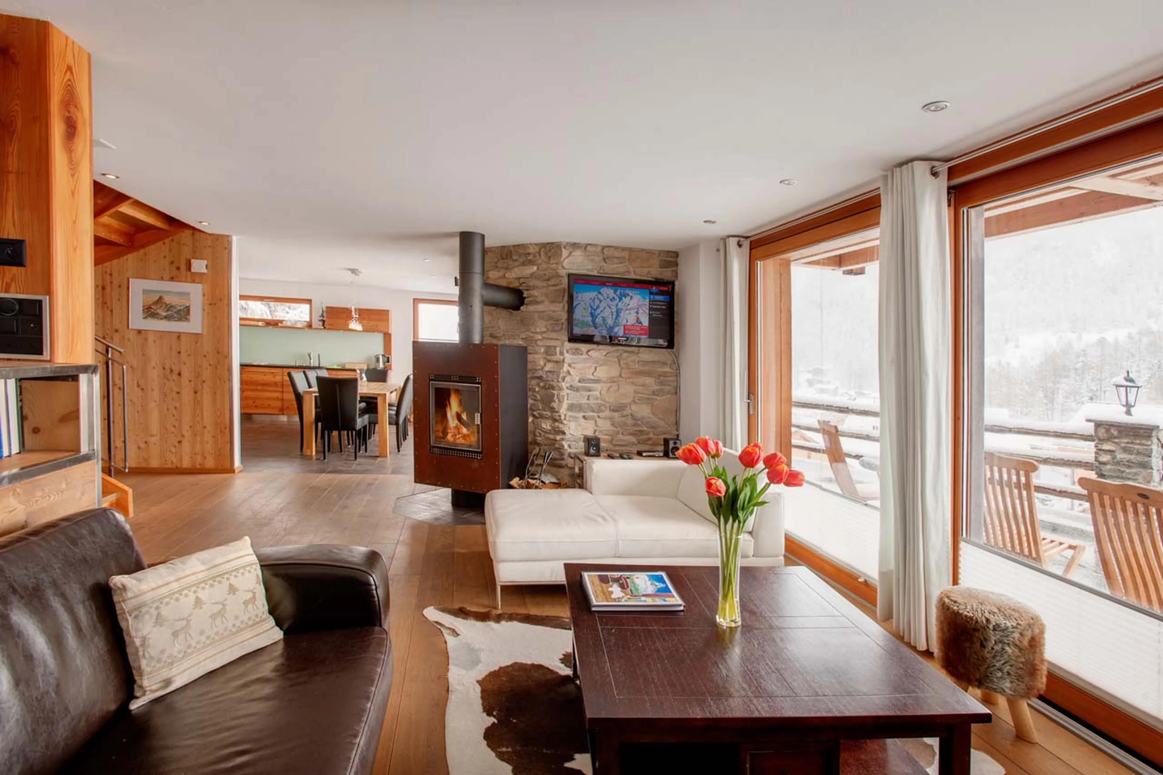 Open plan living area at Chalet Ibron in Zermatt