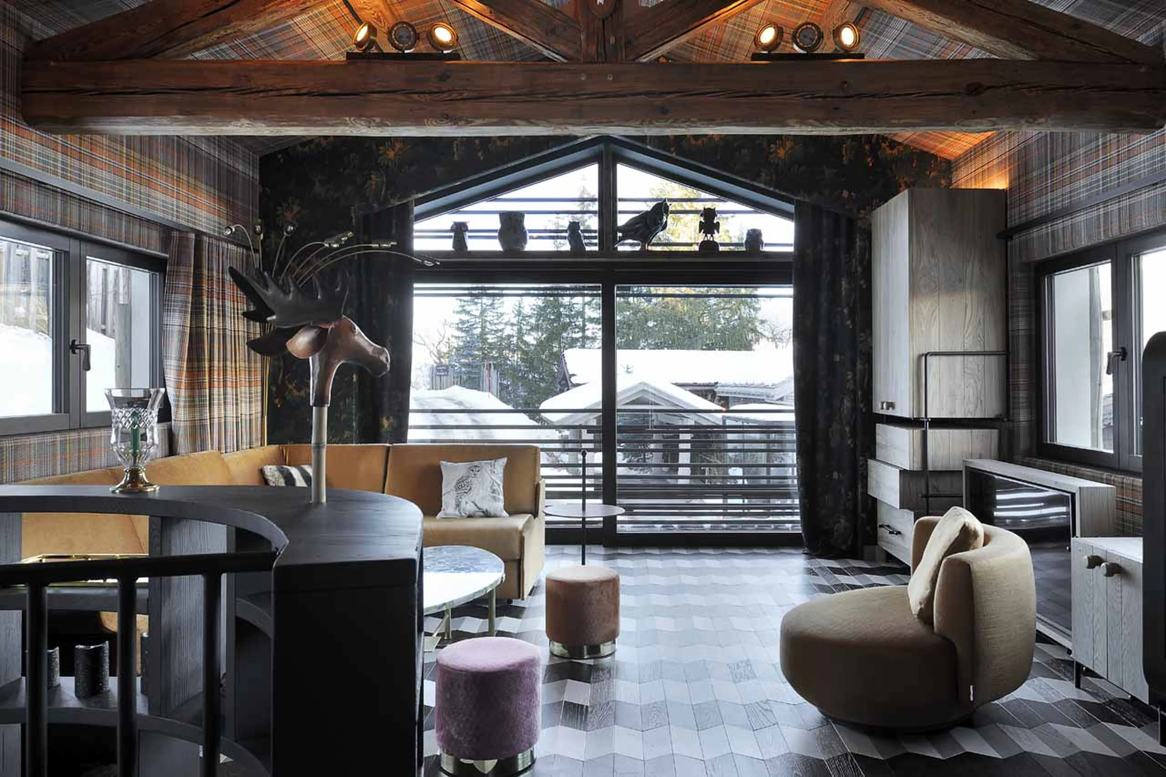 Floor to ceiling windows in living area of Chalet Ikamiut in Courchevel 1550