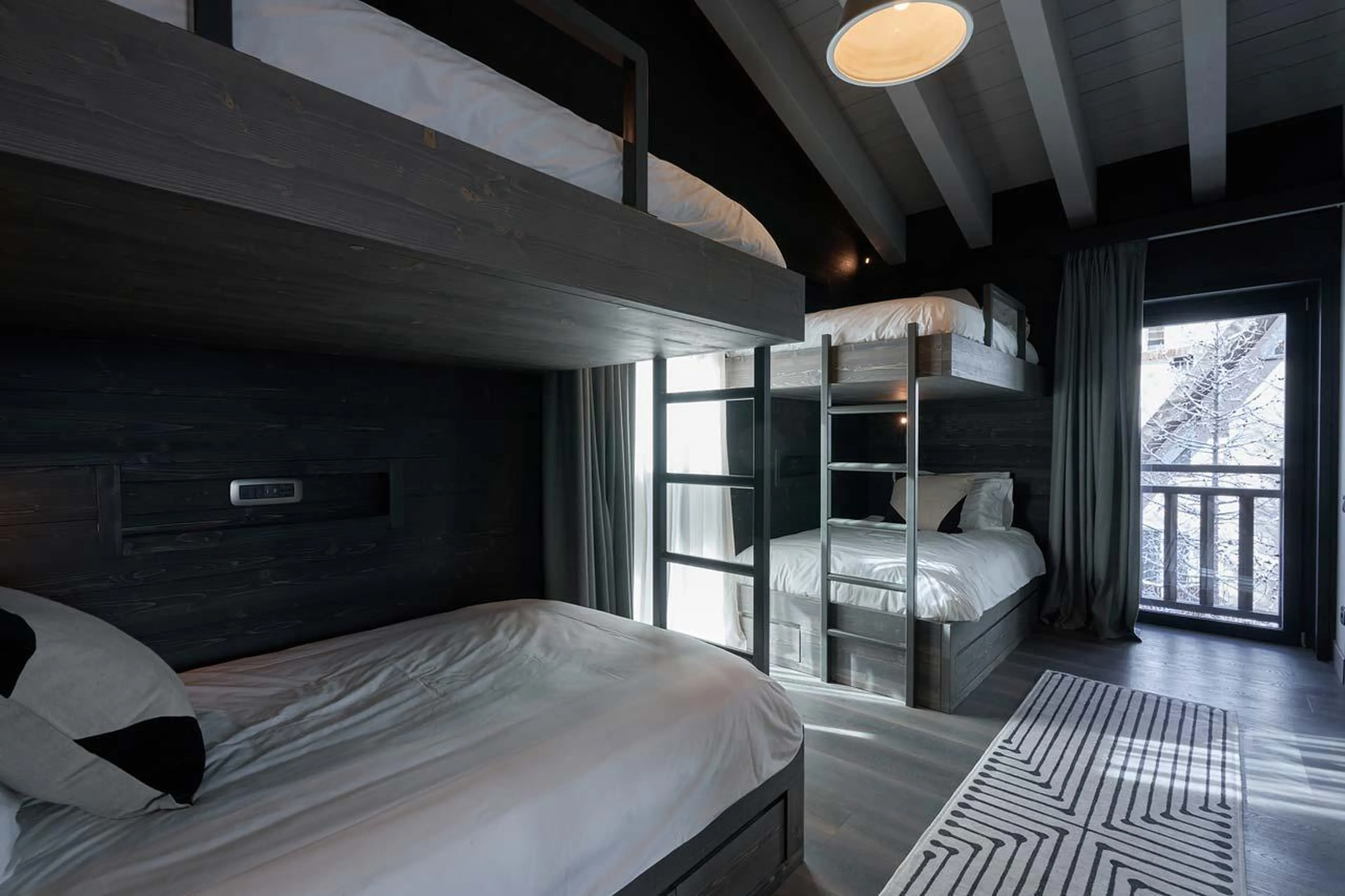 Door to balcony of bedroom six at Chalet Il Gufo in Cervinia